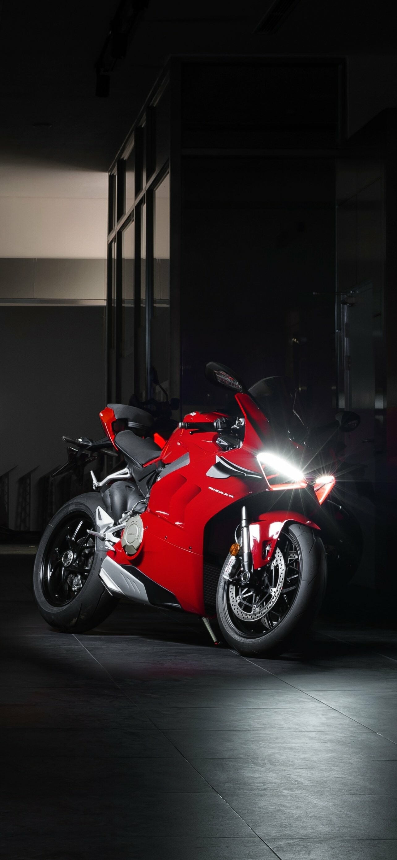 Ducati: Vehicles, Panigale V4, Introduced a revolutionary carbon fiber frame for the Desmosedici GP9. 1290x2780 HD Background.