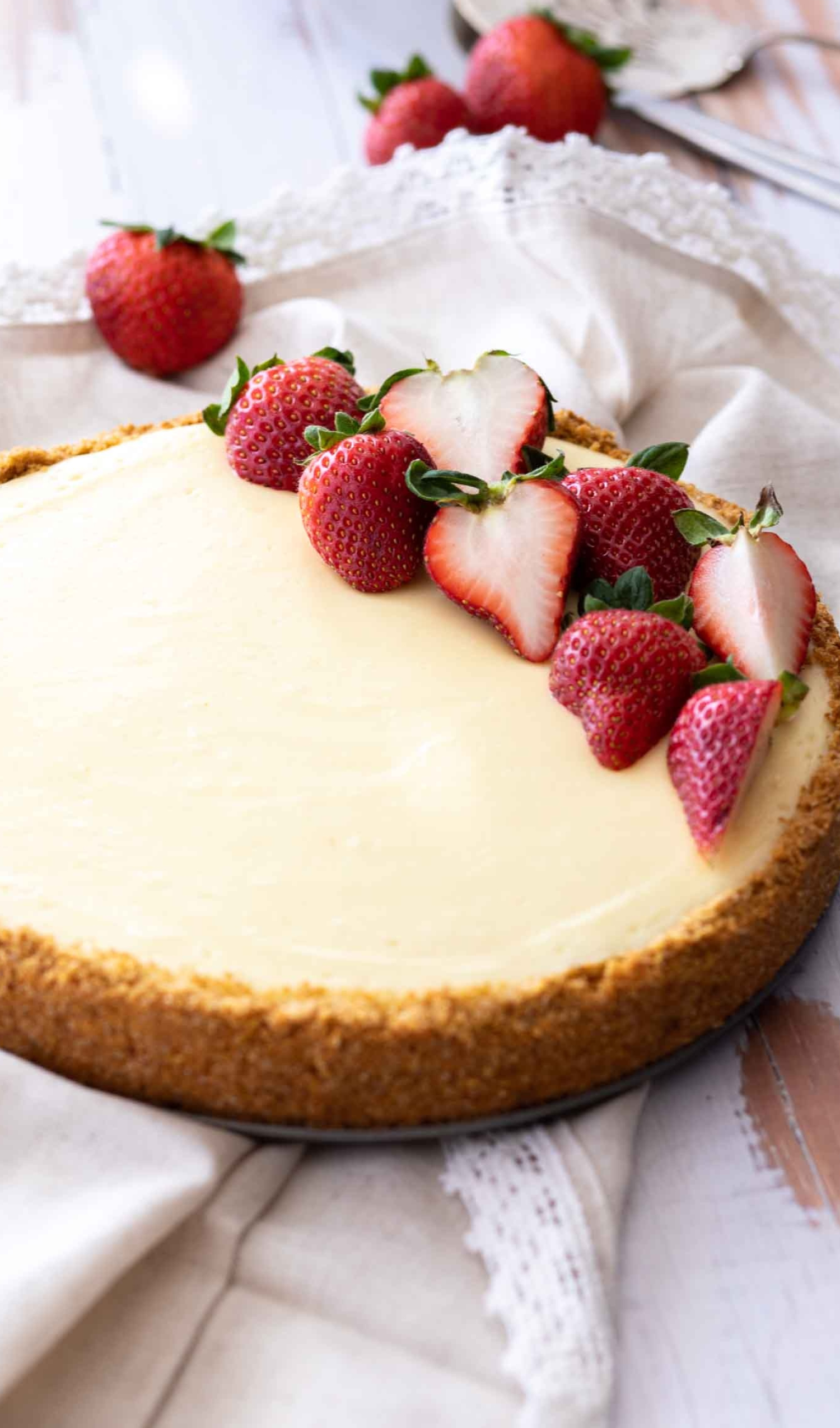 Cheesecake: Typically served chilled, Topped with fresh fruit, glazes, or whipped cream. 1500x2550 HD Background.