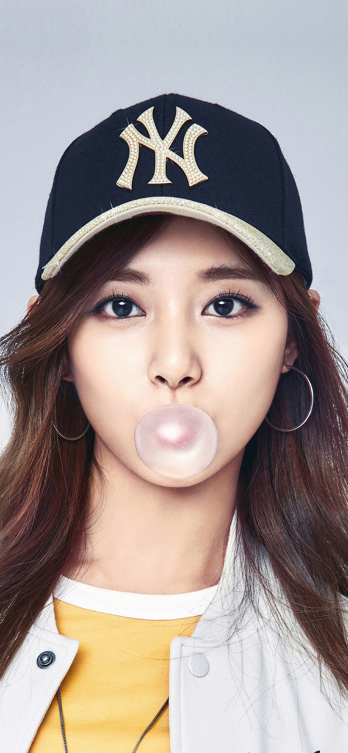 K-pop girl blowing bubble gum, Trendy and stylish, Asian pop inspiration, Bubble-blowing beauty, 1130x2440 HD Phone