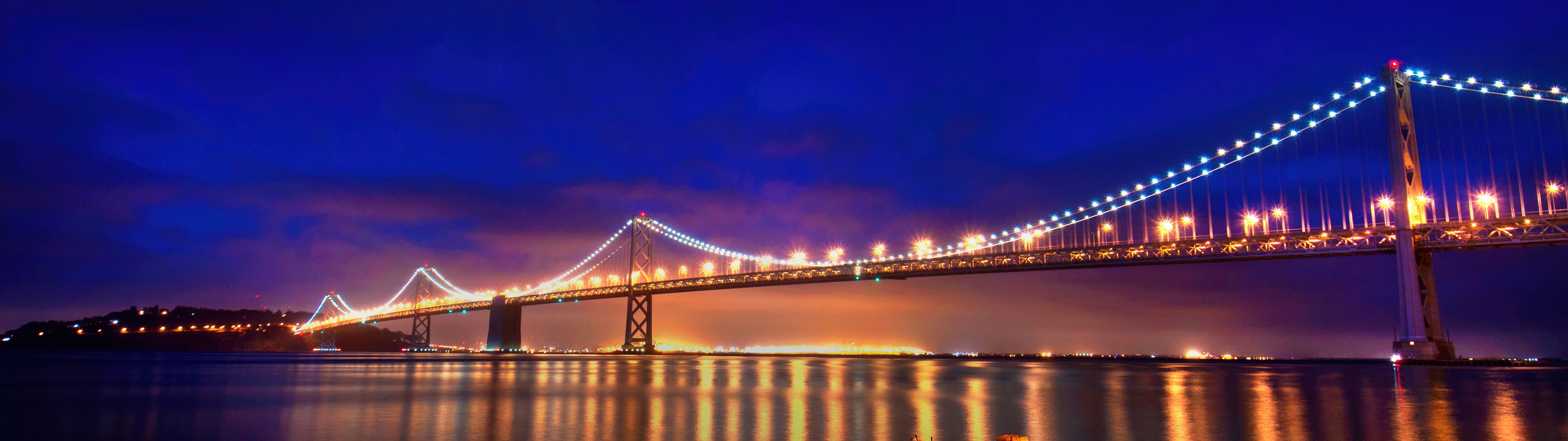 San Francisco Oakland Bay Bridge, Night reflections in blue, 3840x1080 Dual Screen Desktop