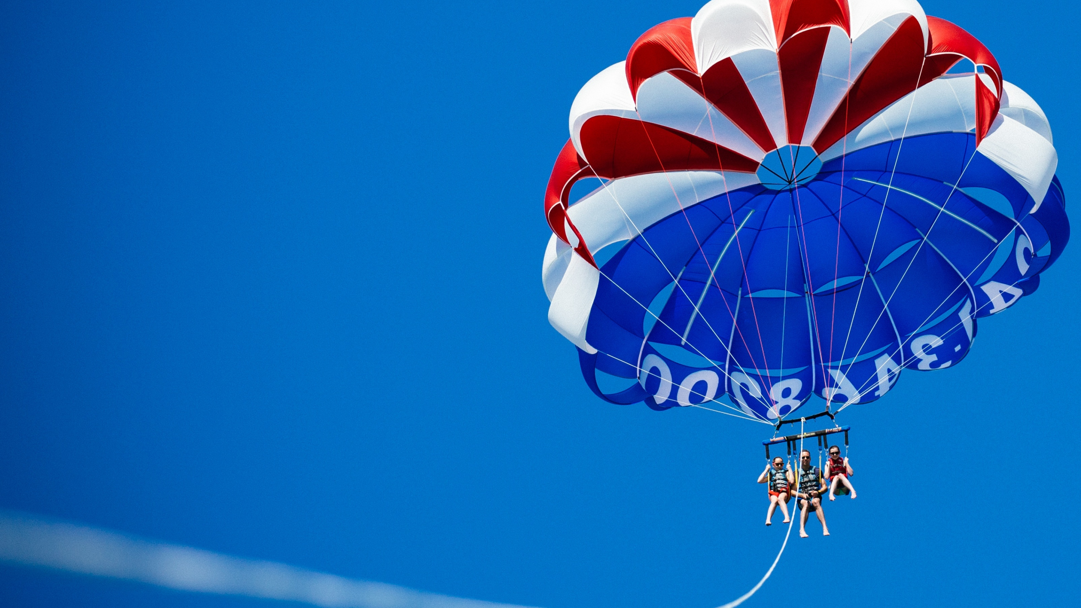 Parasailing: Parachuting sports, Parasail Safety Council, Flying 300 feet above the water. 3560x2000 HD Background.