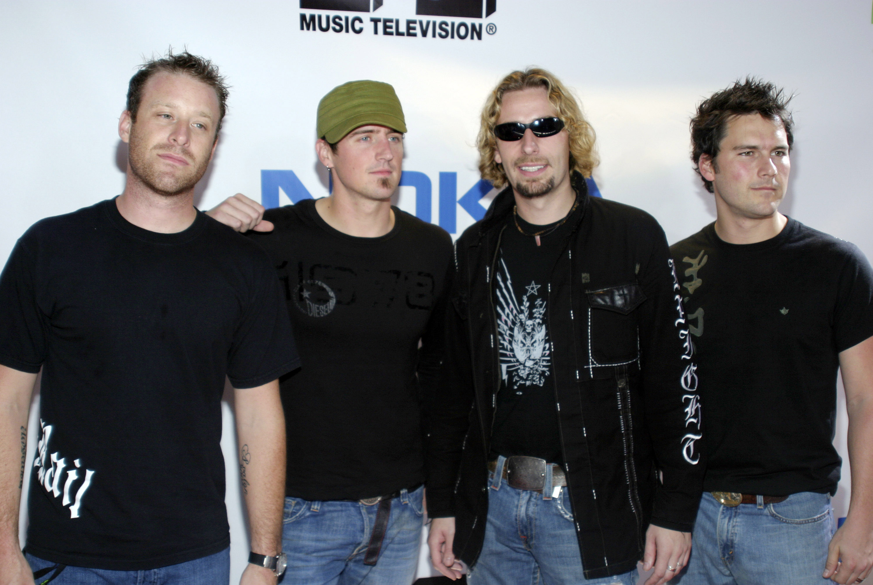 Nickelback: Formed in 1995, Ranked at No. 7 on the Billboard top artist of the decade list. 3000x2010 HD Background.
