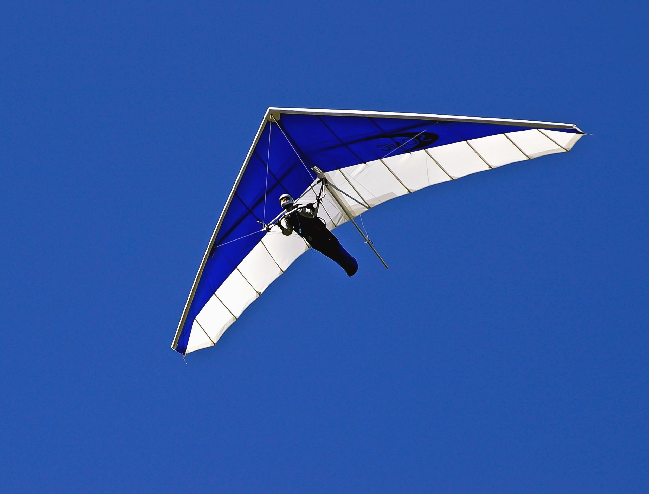 Hang Gliding: An extended flight, Rising air currents, Cross-country flying. 2500x1900 HD Background.