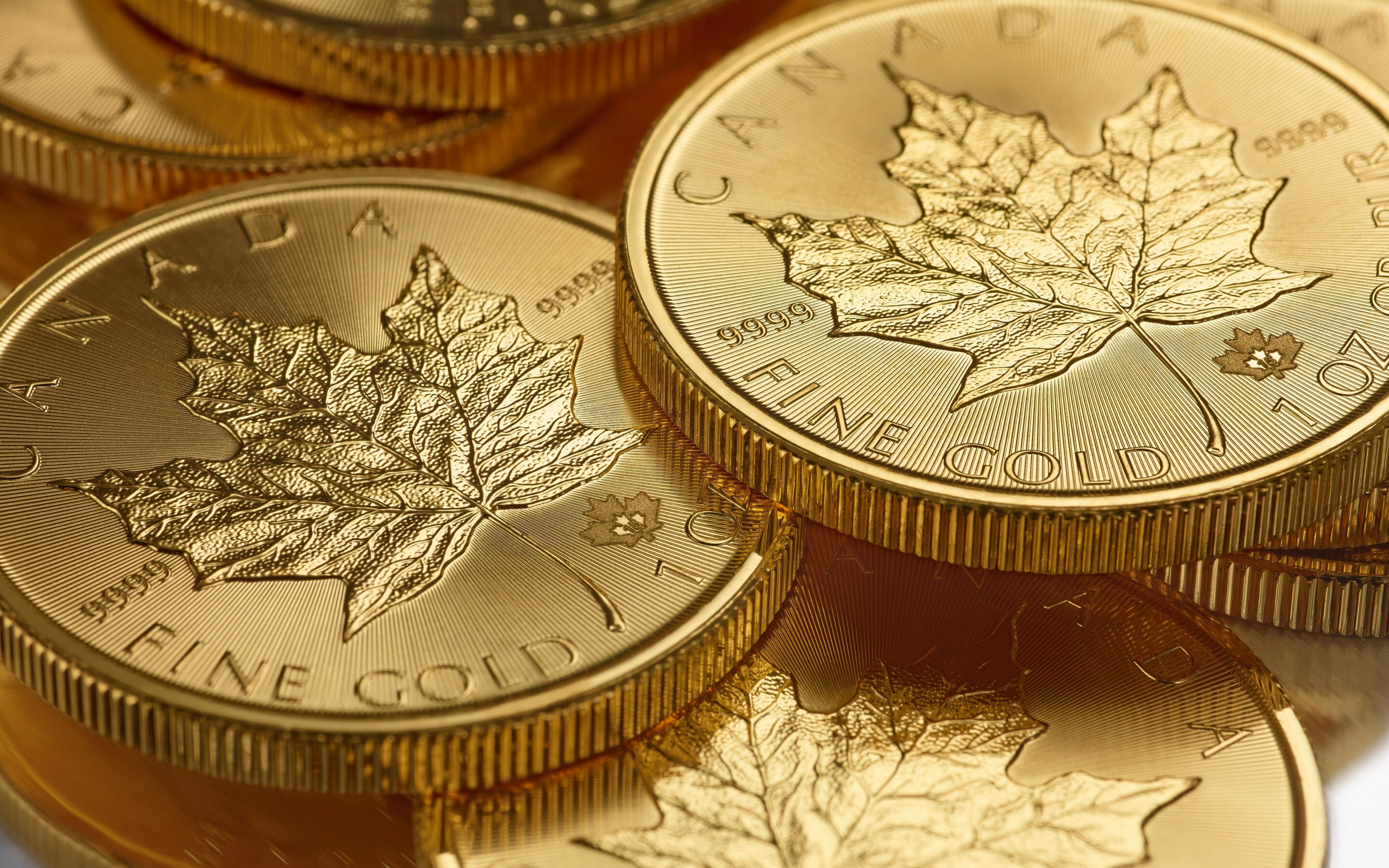 Gold Coins: Canadian Gold Maple Leaf, 9999 millesimal fineness, 24 carats coin, Royal Canadian Mint. 2880x1800 HD Wallpaper.