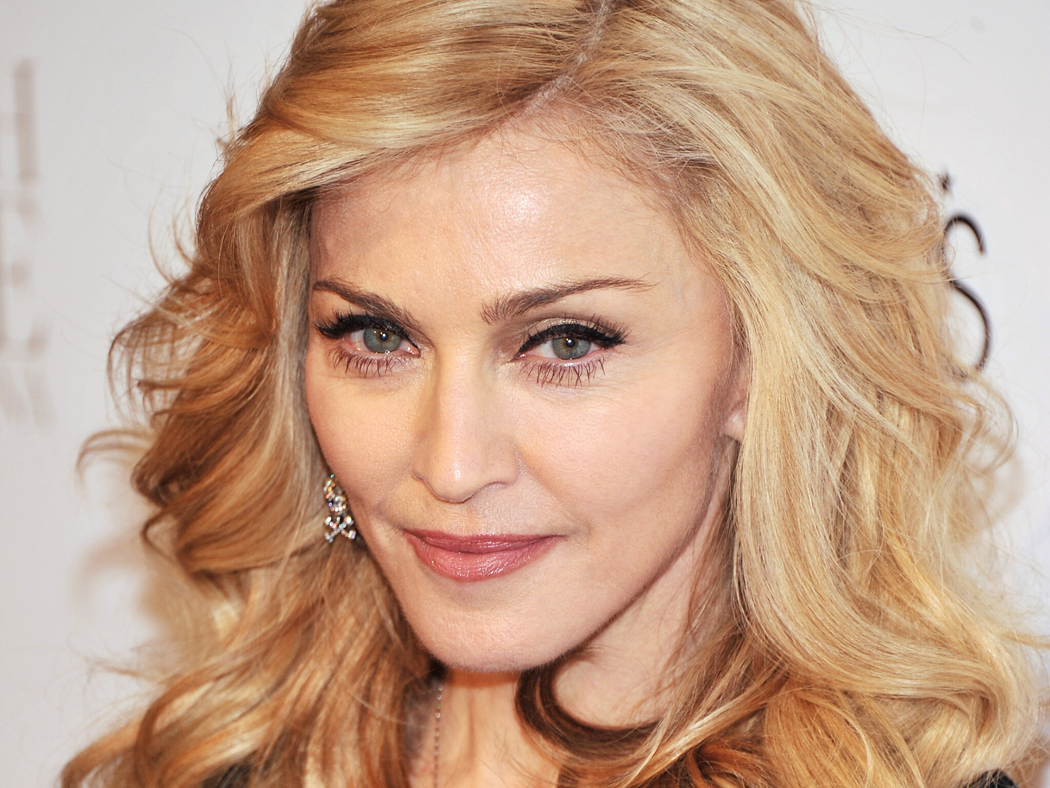 Madonna: Achieved the most number-one singles by a woman in Australia, Canada, Italy, Spain, and the United Kingdom. 2050x1540 HD Wallpaper.