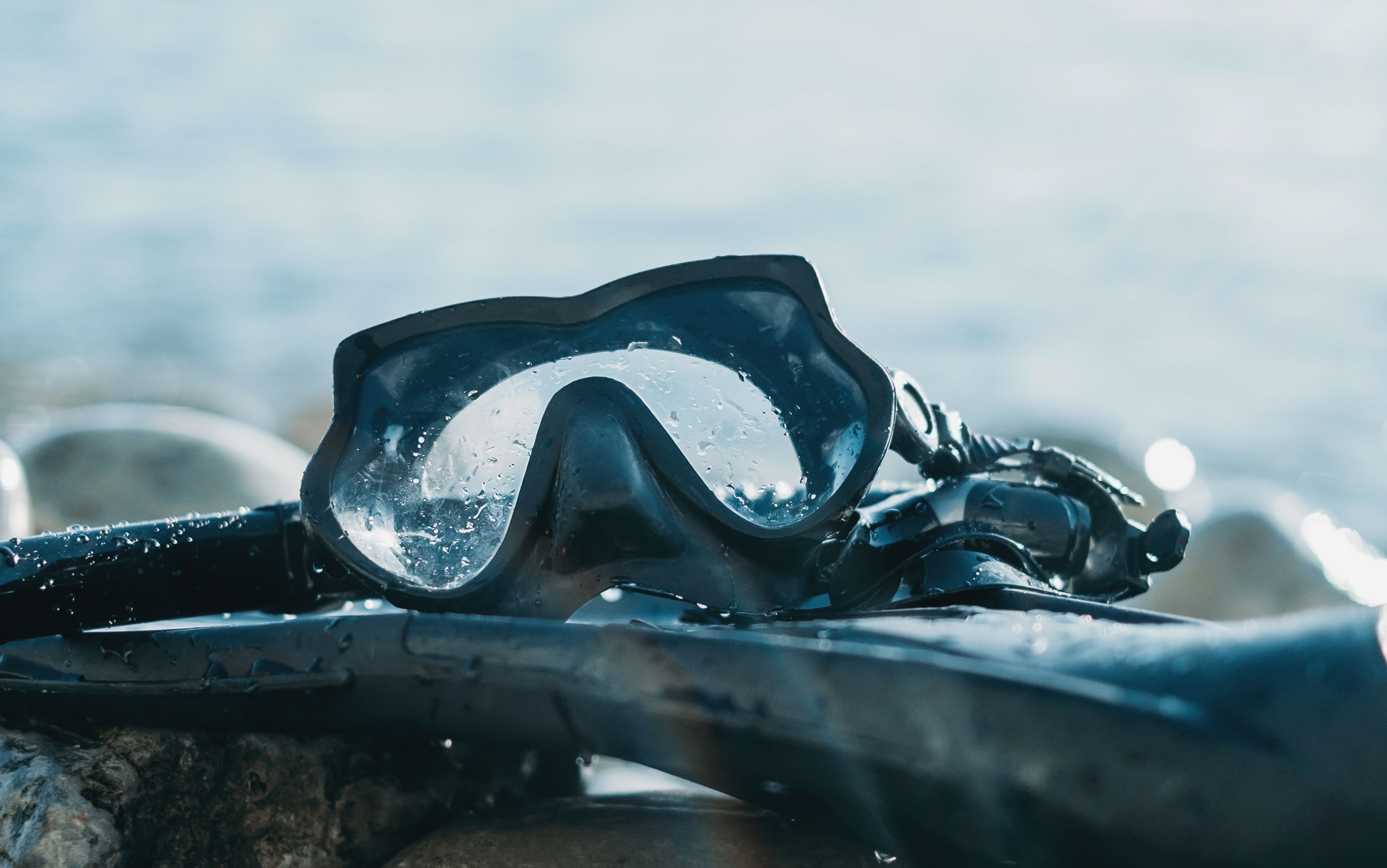 Freediving: Flippers and a diving mask - equipment for an active water sports discipline. 3100x1940 HD Wallpaper.