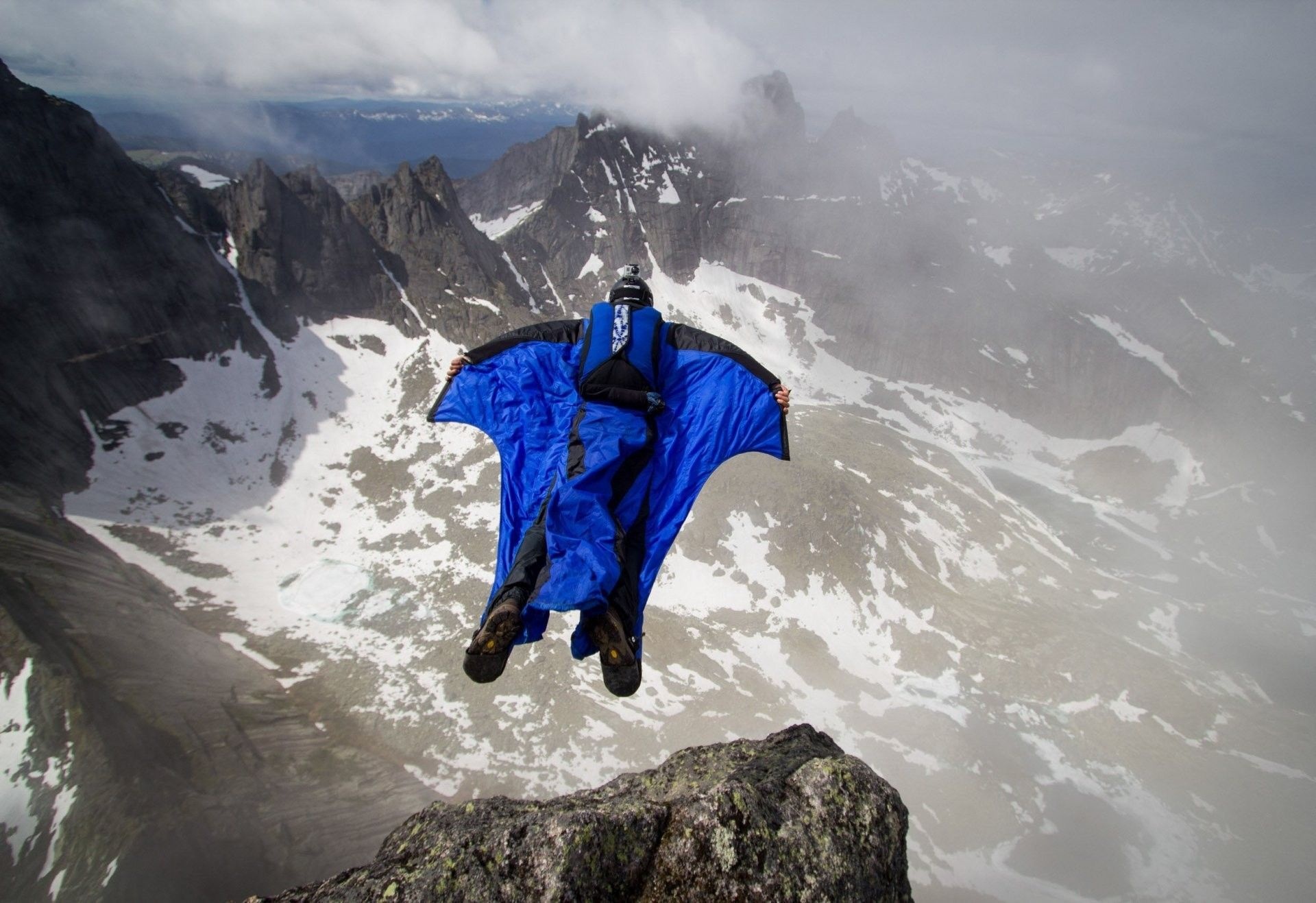 Wingsuit Flying: Wingsuiting in the mountains, Webbing-sleeved jumpsuit technology, Air sport. 1920x1320 HD Background.