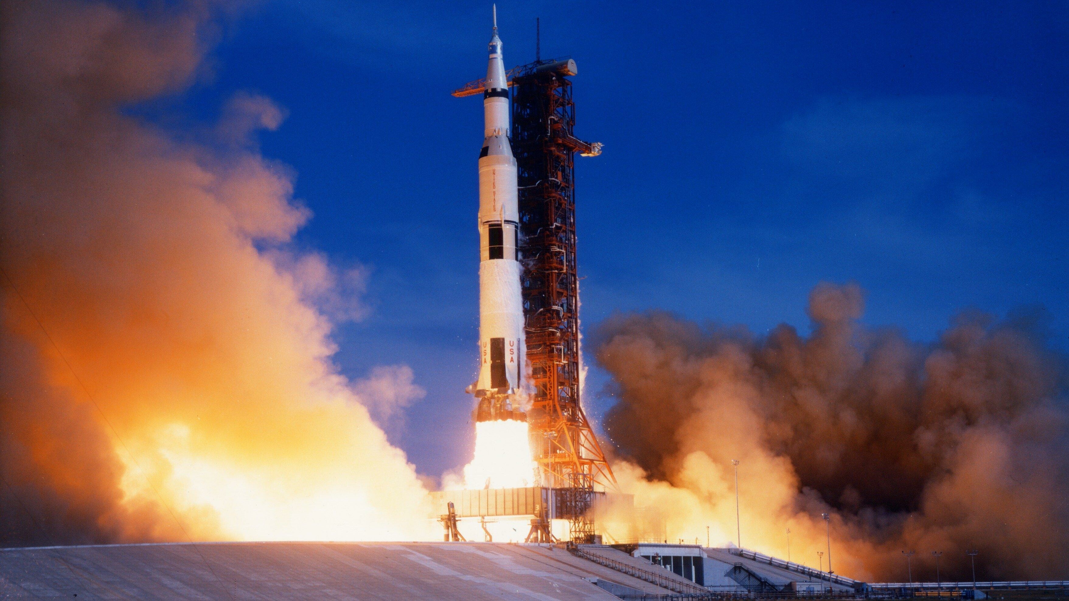 Apollo 11: Saturn V, A retired American super heavy-lift launch vehicle developed by NASA. 3520x1980 HD Background.