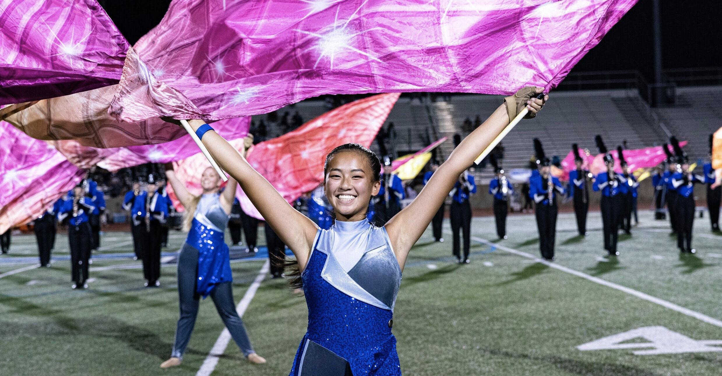 Color Guard (Flag Spinning): The Hebron Band, Military and independent drum corps. 2480x1300 HD Wallpaper.