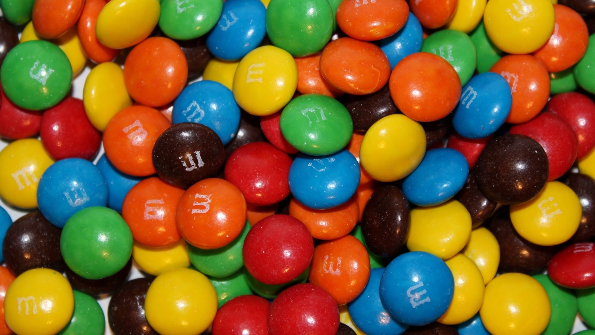 Vibrant M&M's, Eye-catching wallpapers, Tasty delights, Sugar-coated goodness, 1920x1080 Full HD Desktop