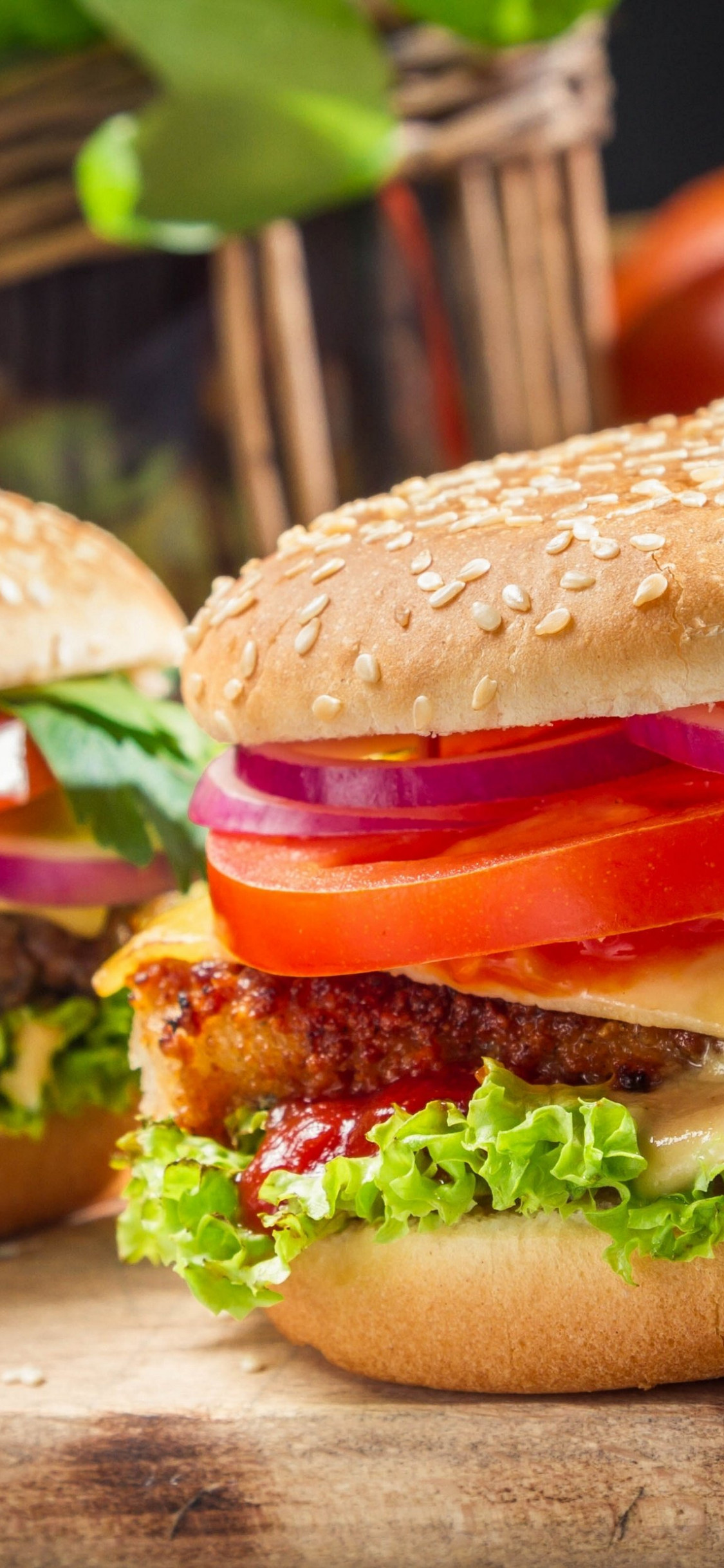 Hamburger: Ground beef combined with breadcrumbs, eggs, and seasonings. 1130x2440 HD Background.