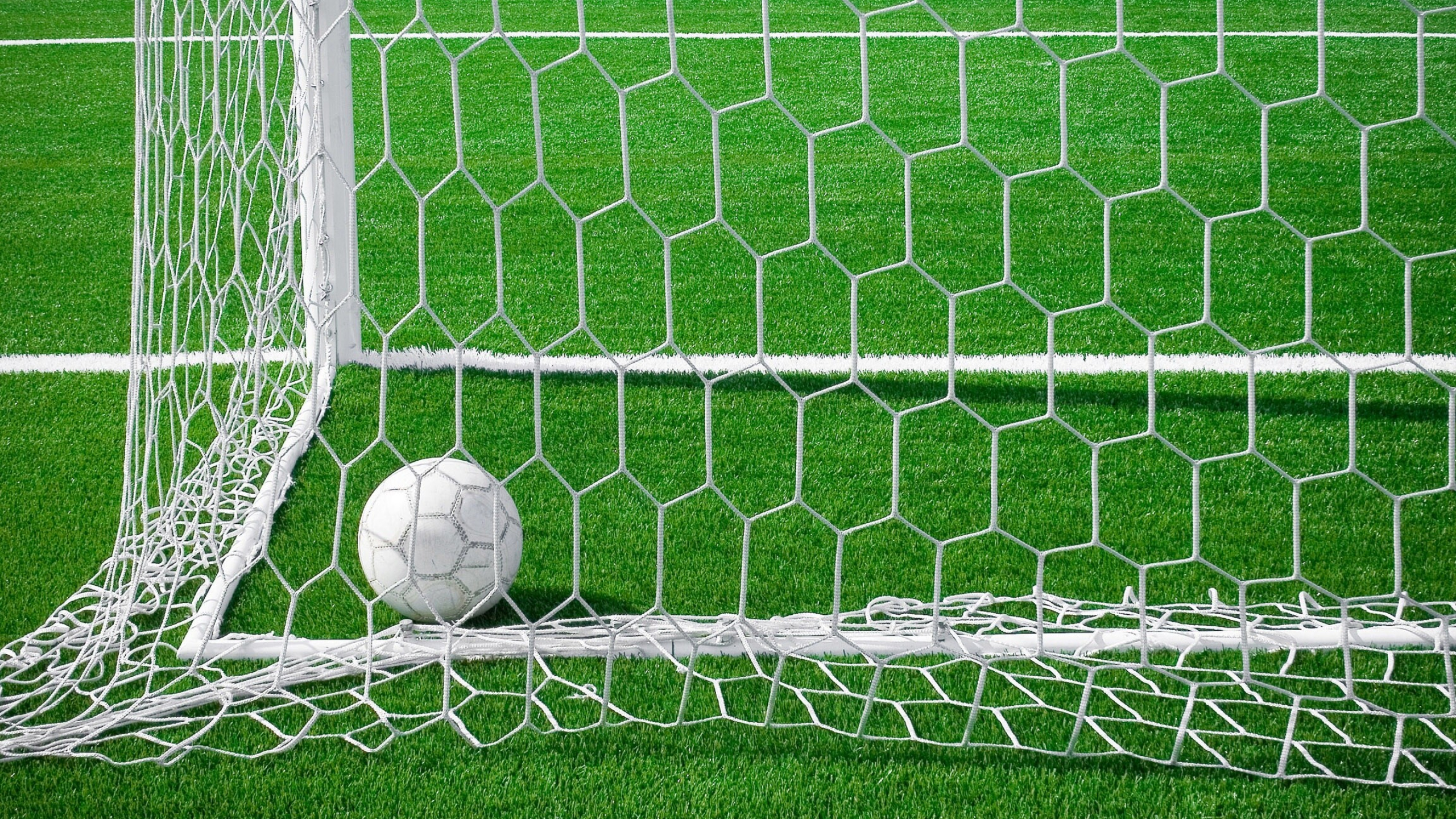 Goal (Sports): The goal post nets, Made of #21 200 Lb. test nylon netting, A net attached behind the goal frame. 2560x1440 HD Background.