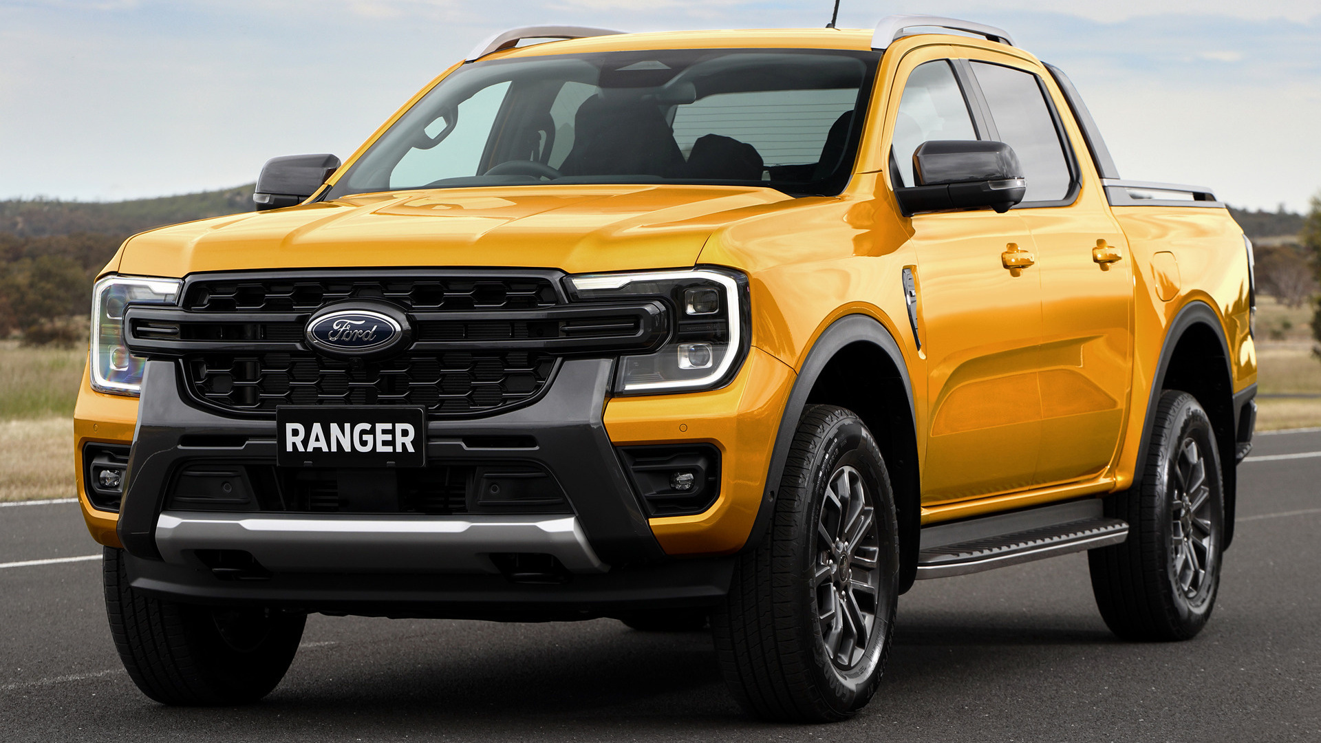 Ford Ranger: 2022 Wildtrak Double Cab, powered by a 2.3-liter EcoBoost four-cylinder engine. 1920x1080 Full HD Background.