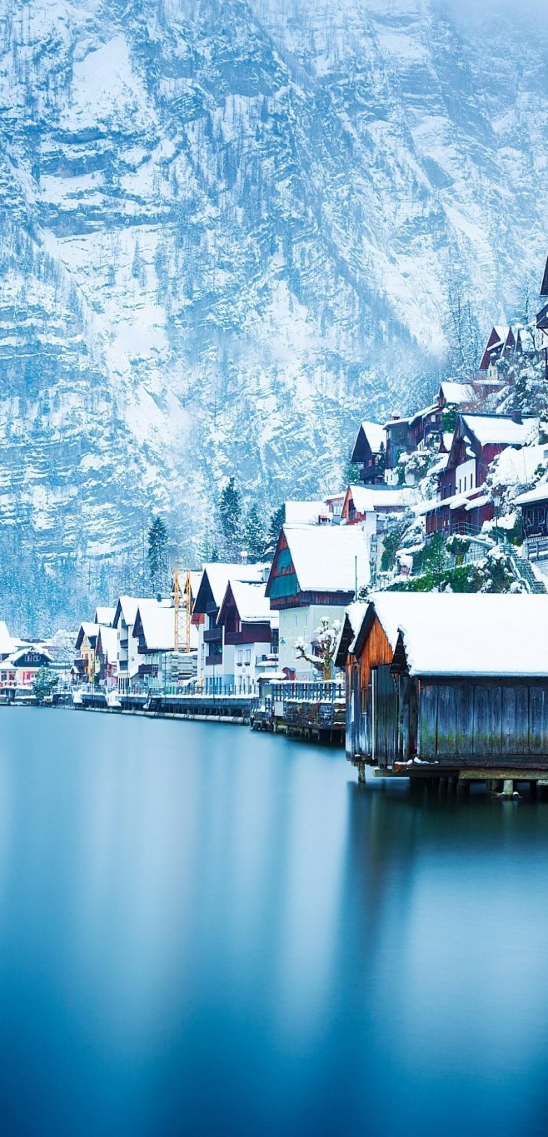 Austria: Hallstatt, The country's cuisine including schnitzel, strudel, and Wiener sausages. 1080x2240 HD Background.