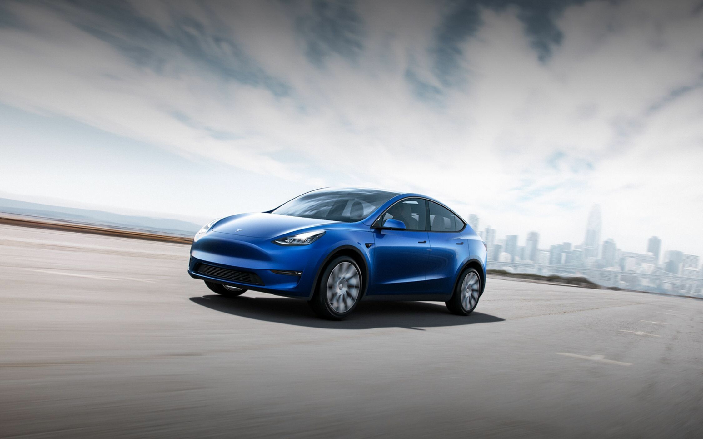 Tesla Model Y: The car was premiered by the Elon Musk at an event at design studio in Hawthorne, CA on March 14, 2019. 2250x1410 HD Background.