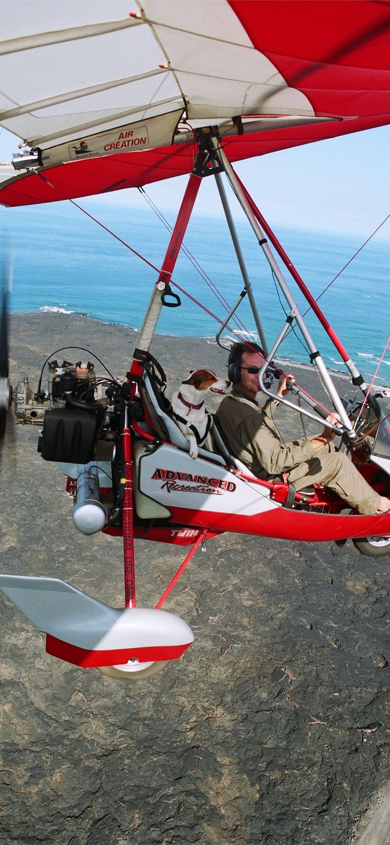 Hang Gliding: A specially designed ultralight aircraft, The jet hang glider. 1290x2780 HD Background.