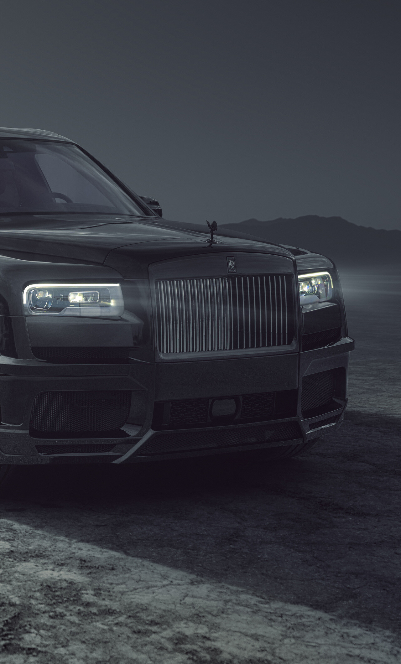 Rolls-Royce: The Cullinan sits above the Ghost and below the Phantom in the brand's line. 1280x2120 HD Background.