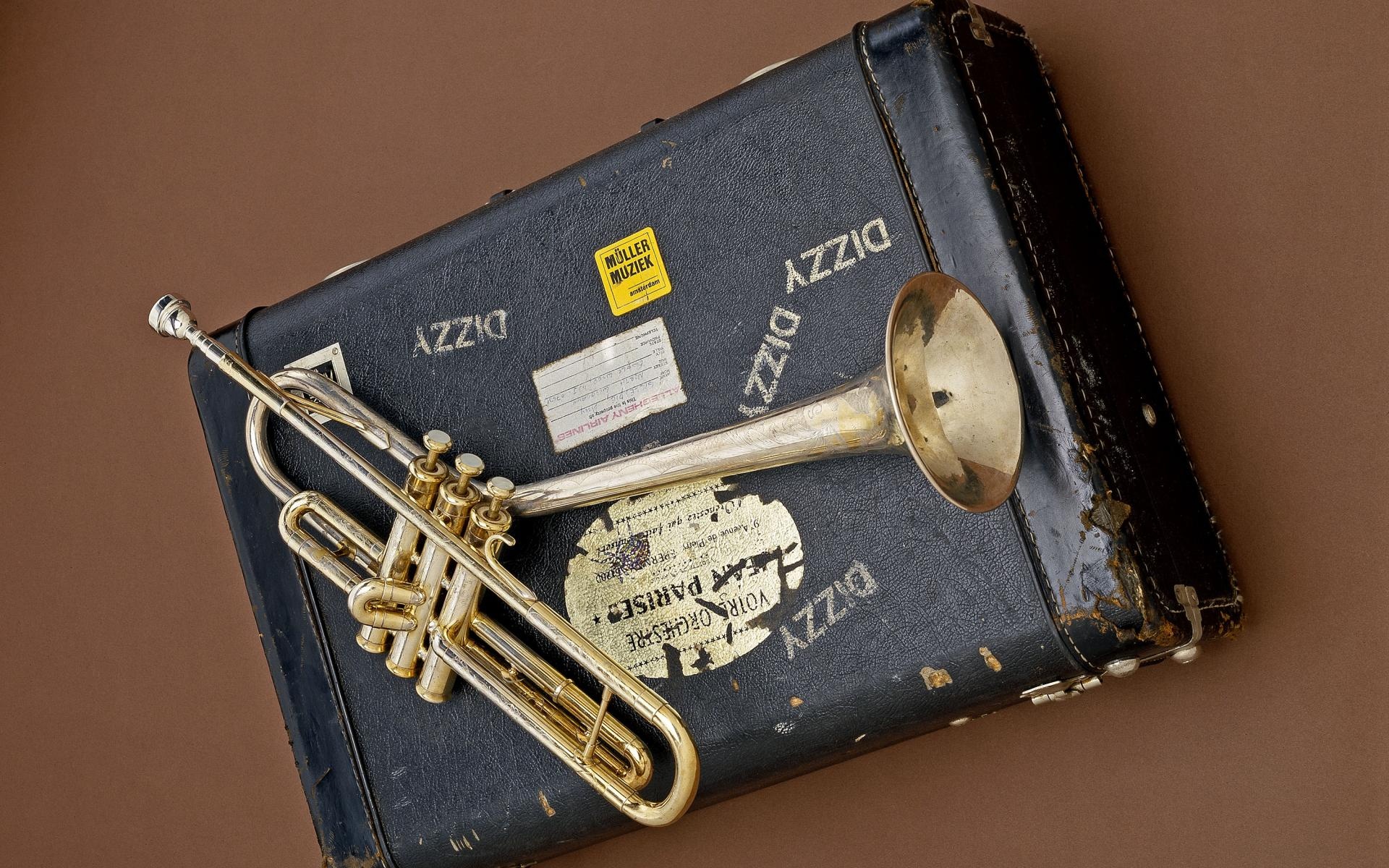 Trumpet: An old brass instrument, A case, A cylindrical tube with two turns, Vintage. 1920x1200 HD Background.