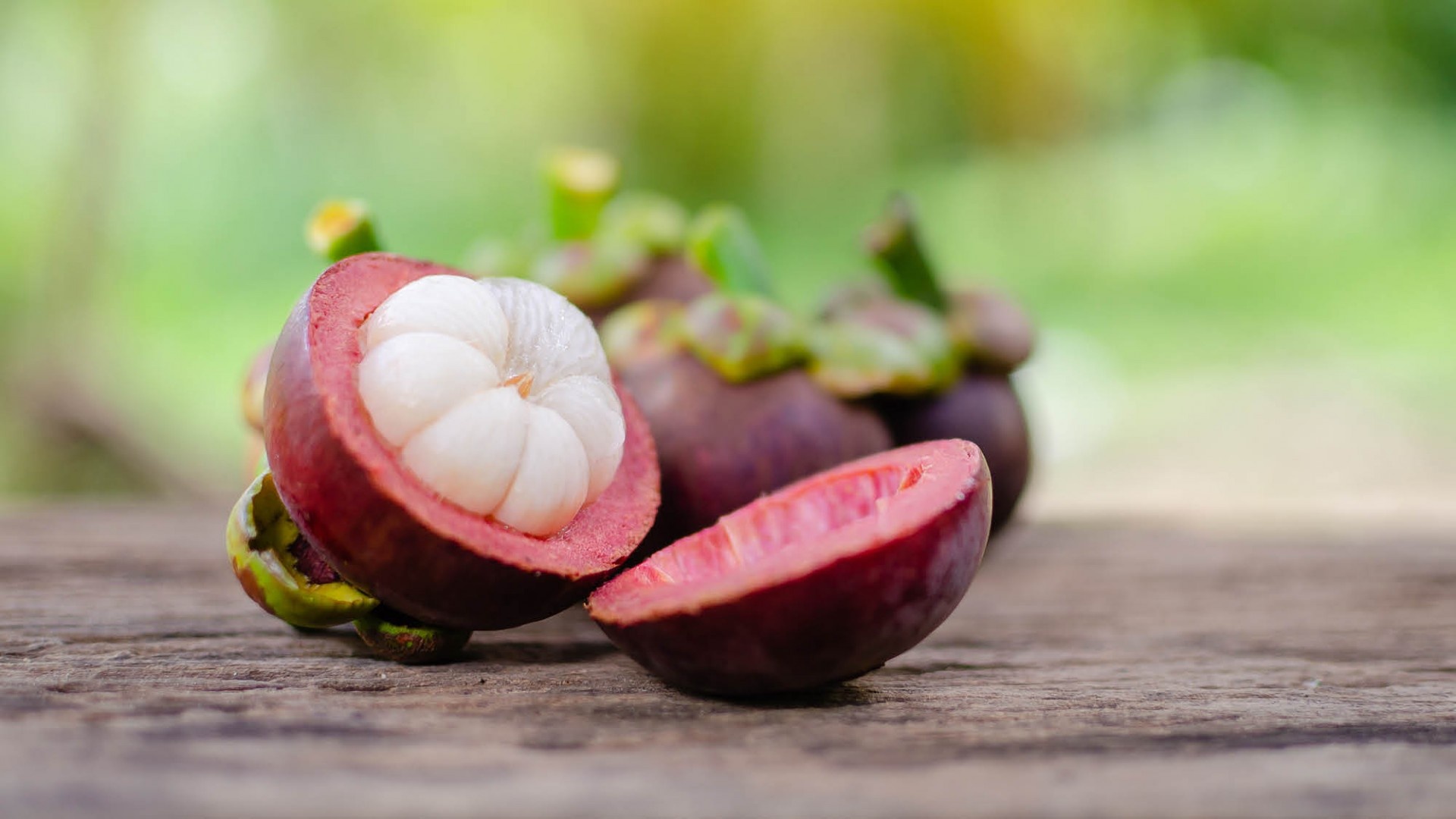 Mangosteen: Labeled as "superfruit" due to high content of antioxidants. 1920x1080 Full HD Wallpaper.