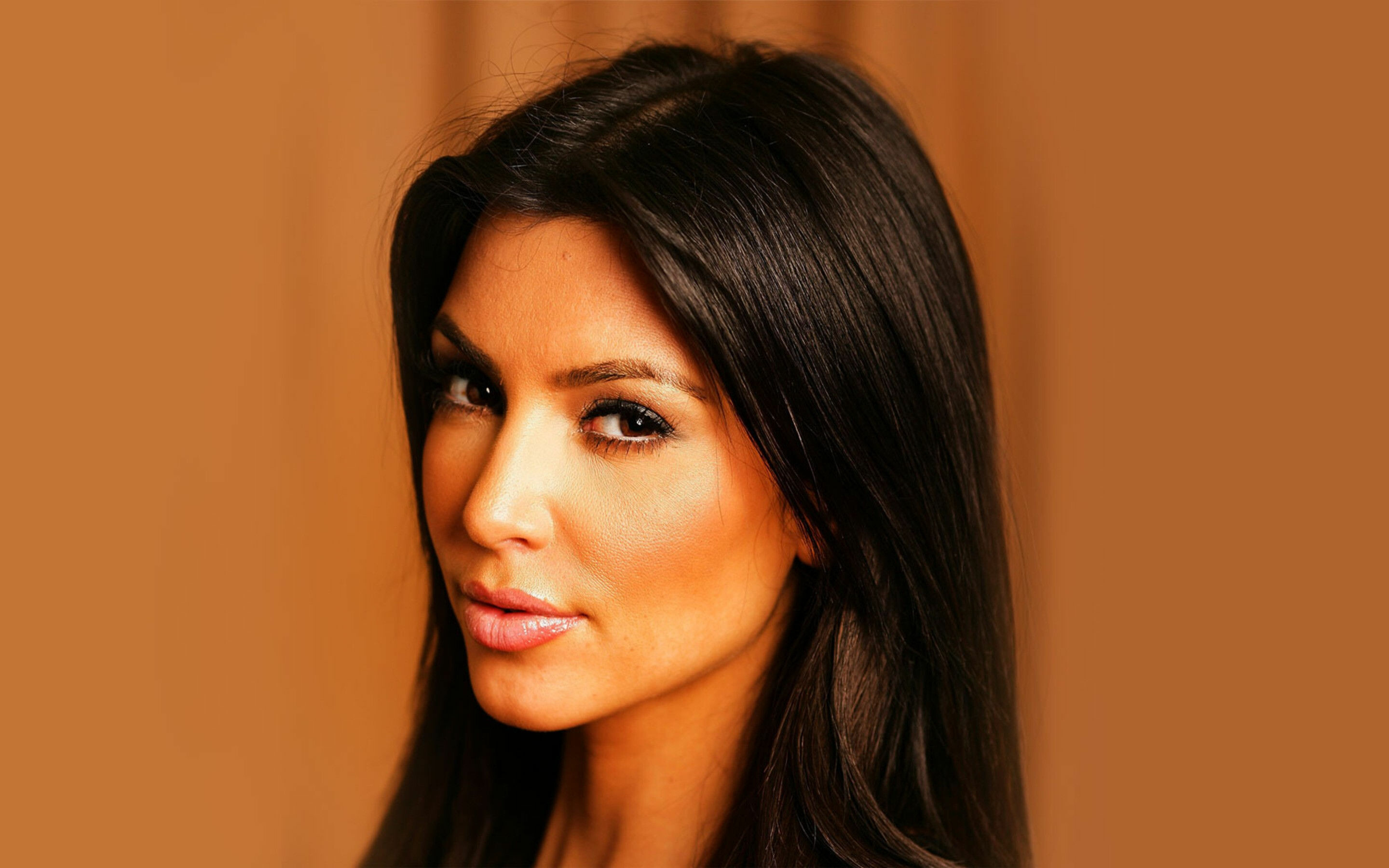 Kim Kardashian: A reality TV star, social media influencer, and entrepreneur. 2880x1800 HD Background.