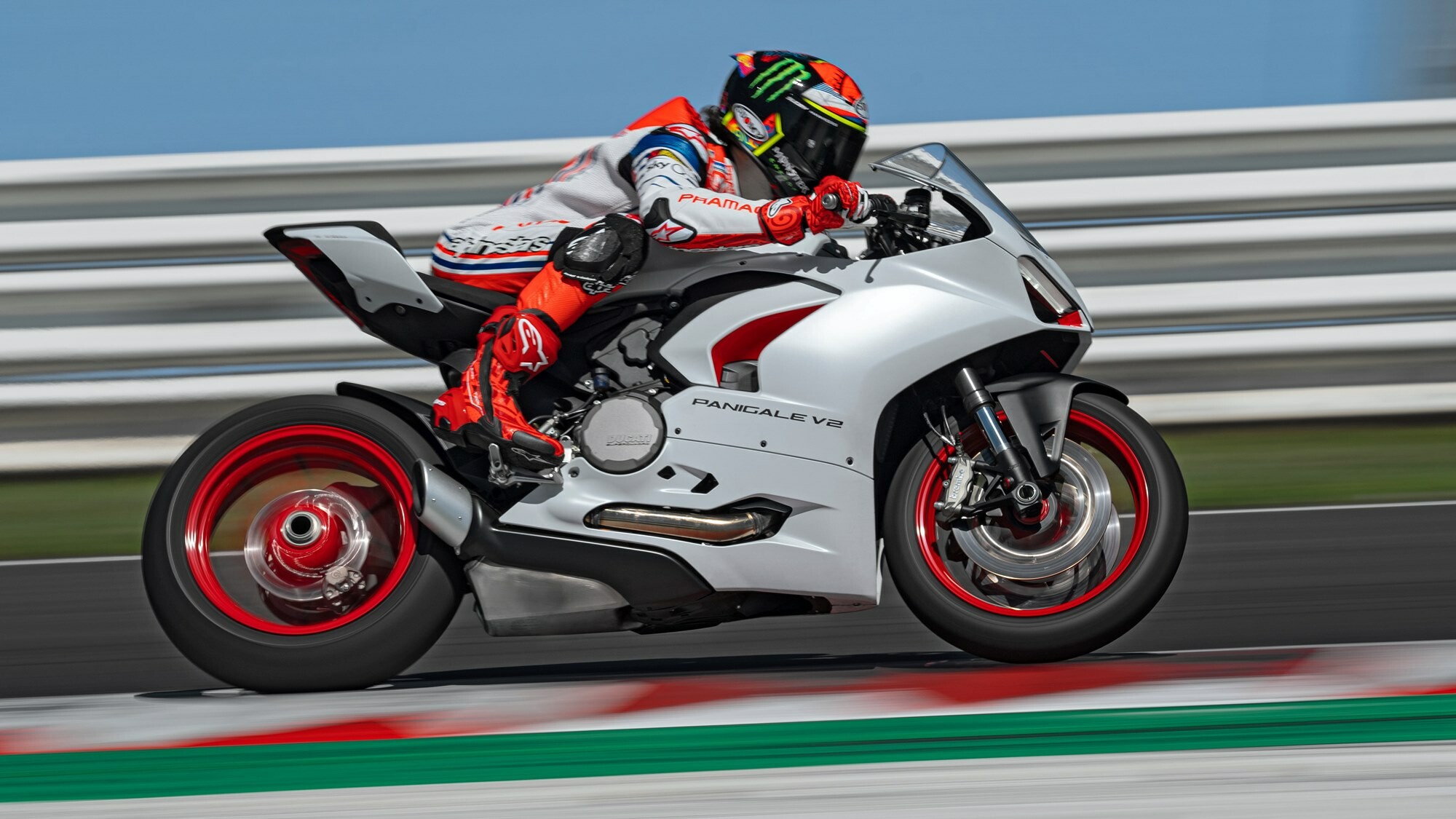 Ducati Panigale V2: 955 cc V-twin engine sport bike, White Rosso livery. 2000x1130 HD Wallpaper.