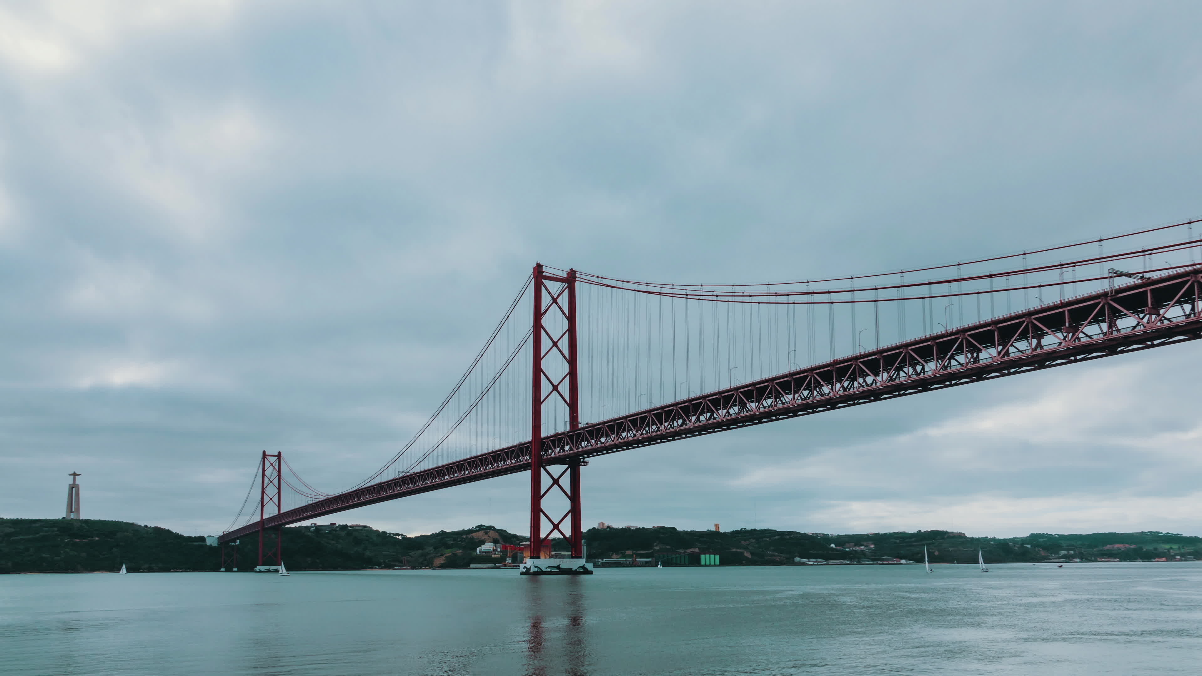 Bridge: Ponte 25 de Abril, The city of Lisbon connected to the municipality of Almada, Tagus river, Portugal. 3840x2160 4K Wallpaper.