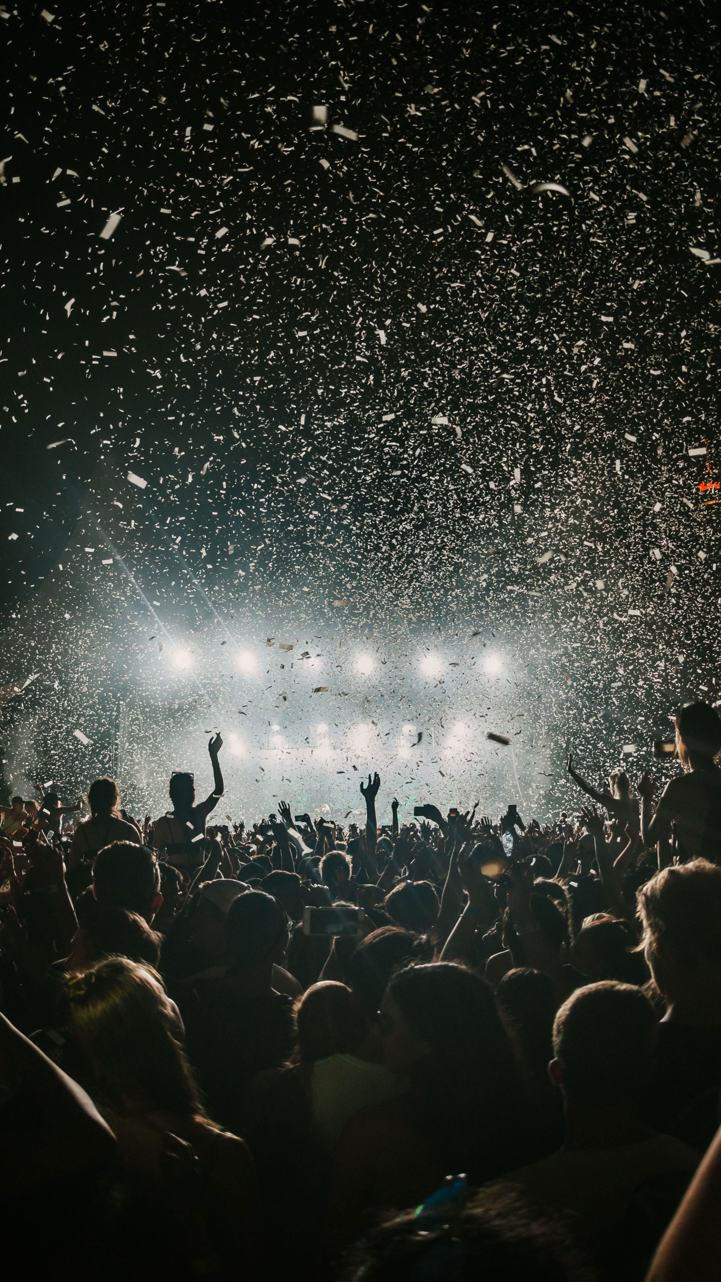 Concert: People gathering on  the concert field, Special effects, Confetti explosions. 1440x2560 HD Background.