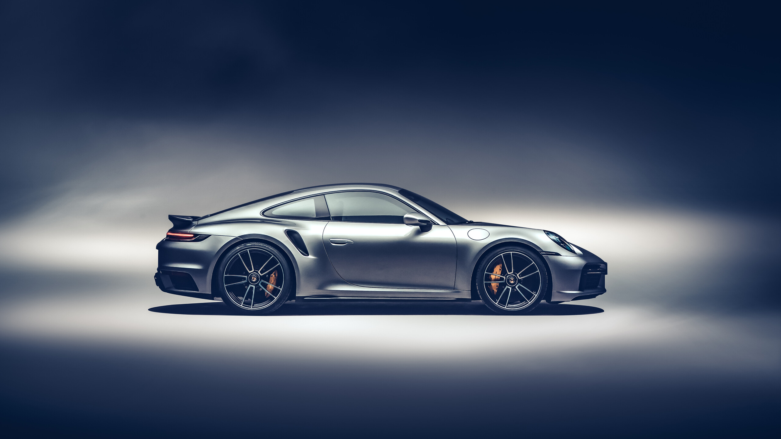 Porsche 911: 2021Turbo S, The 930 Turbo was introduced for the 1975 model year. 2560x1440 HD Background.