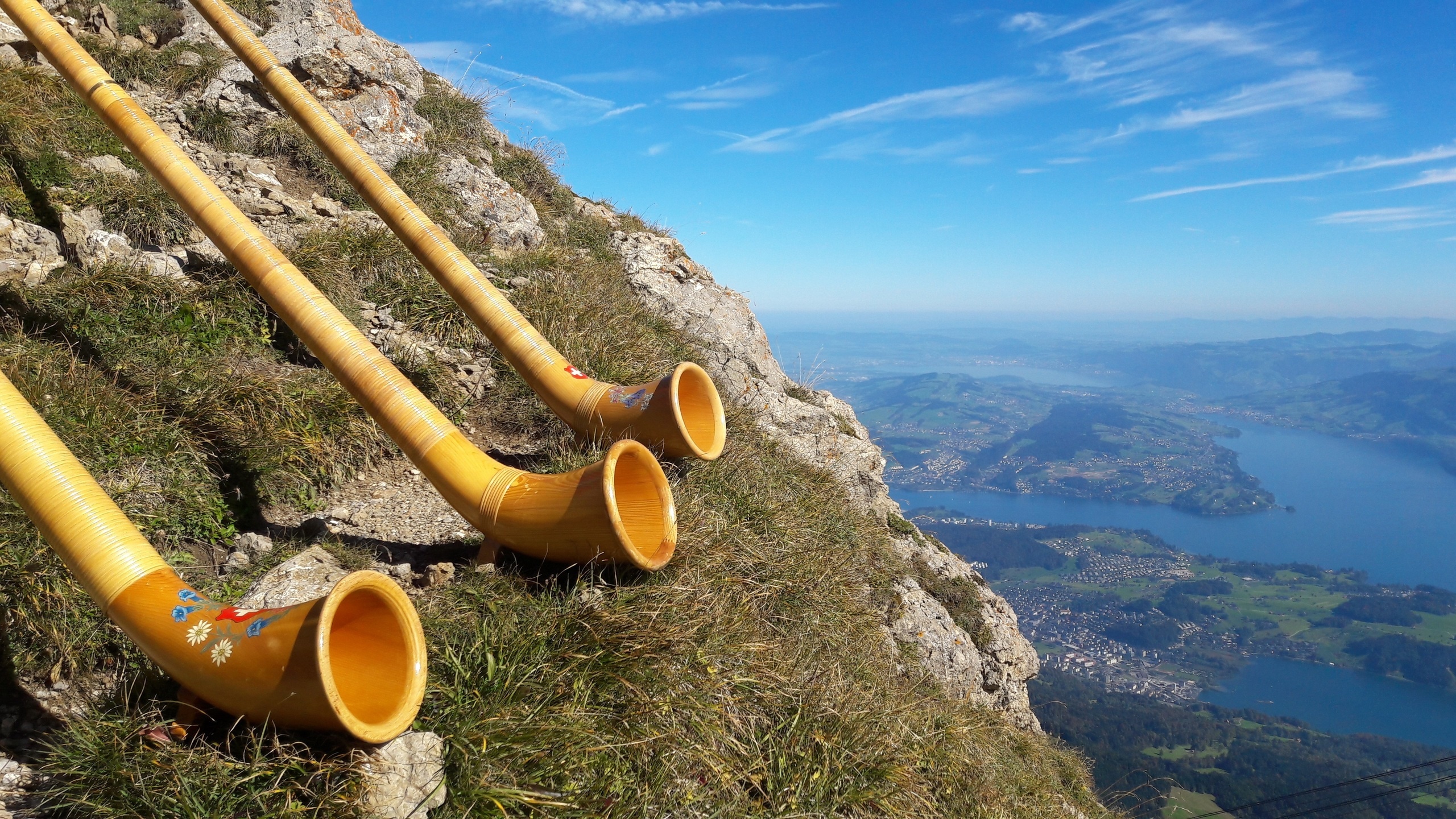 Alphorn: Swiss alpine shepherd culture, Spruce wood, Making a sound using this traditional musical instrument. 2560x1440 HD Wallpaper.
