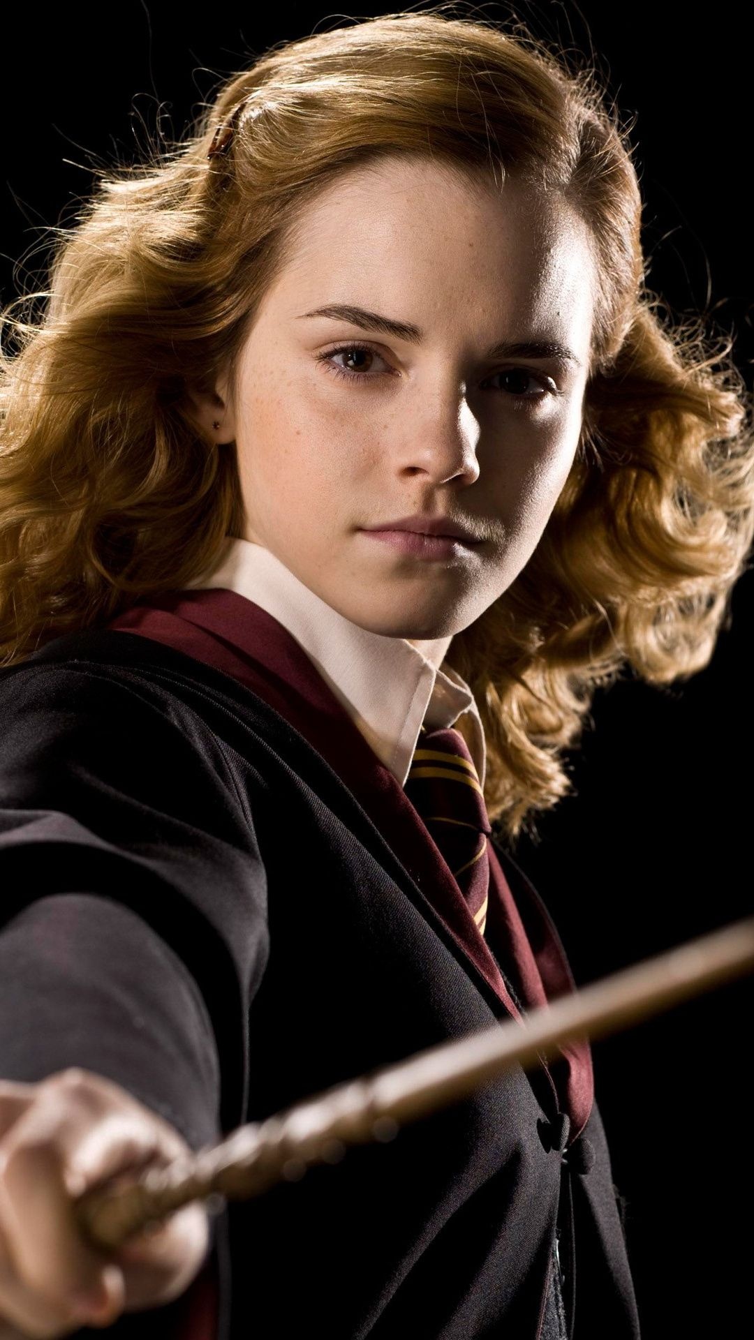 Hermione: A Muggle-born witch who became aware of her magical abilities at the age of 11. 1080x1920 Full HD Background.