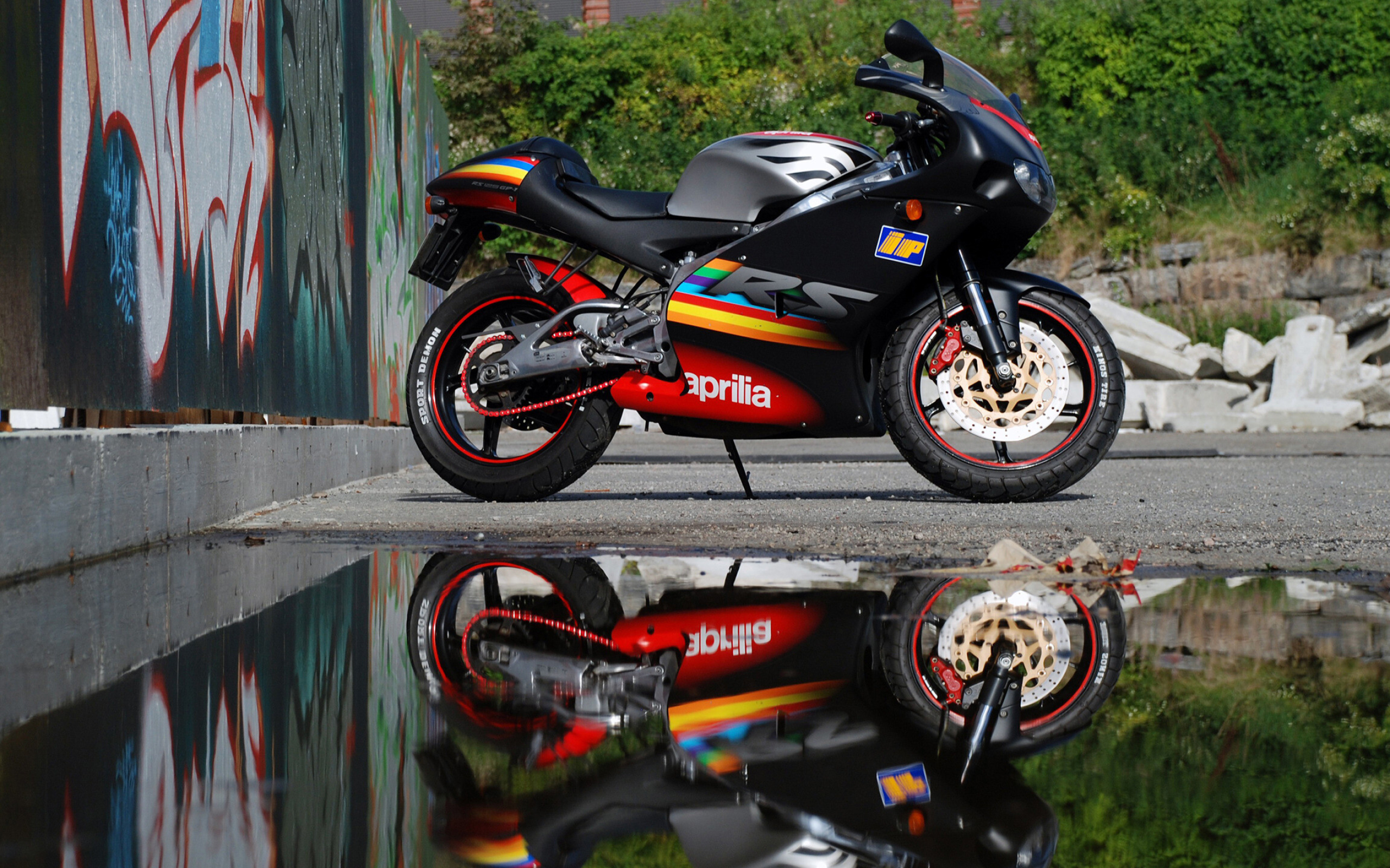 Aprilia: RS125, A GP derived replica sport production motorcycle. 2560x1600 HD Background.