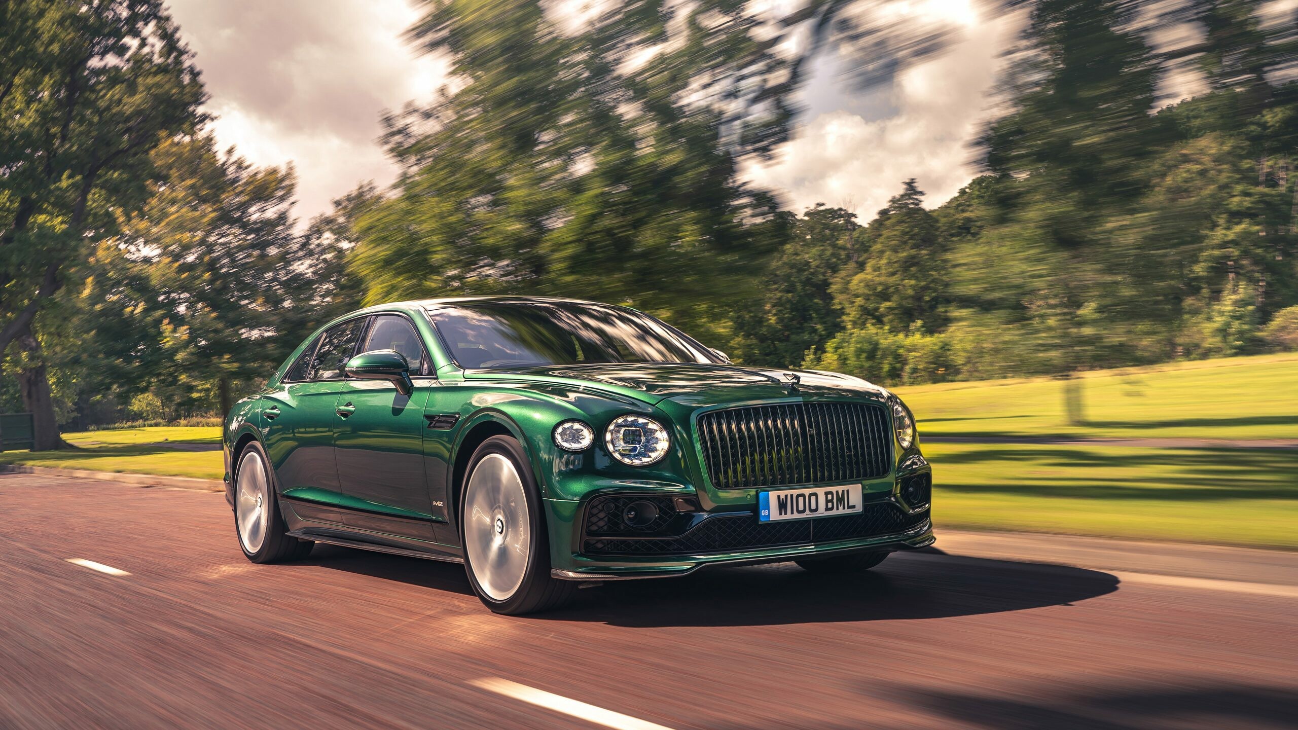 Bentley: It is the four-door grand tourer variant of the Bentley Continental GT coupe. 2560x1440 HD Wallpaper.