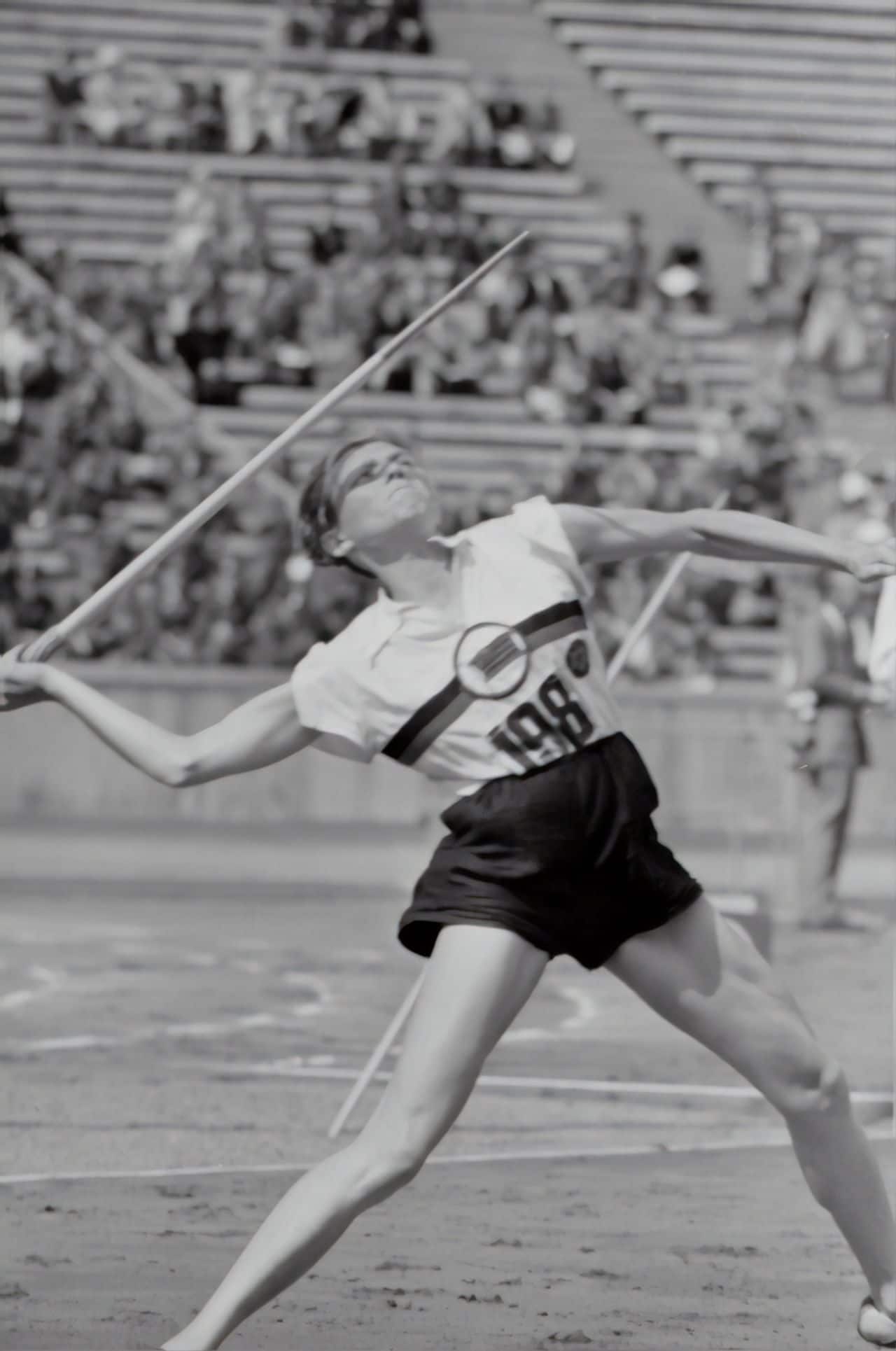 Javelin Throw: A tossing event in which athletes toss a metal-tipped spear as far as possible. 1280x1930 HD Wallpaper.
