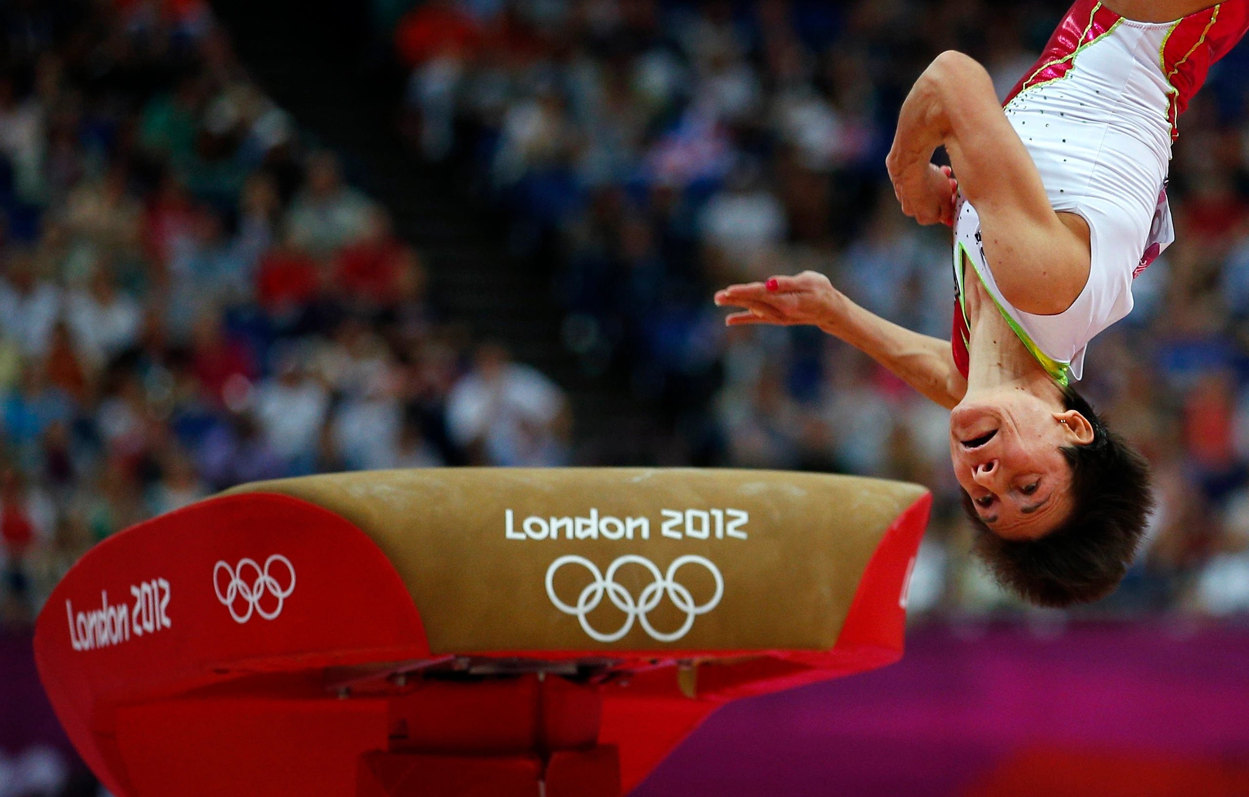 Vault (Gymnastics): Oksana Chusovitina, An eight-time Olympic gymnast, The 2012 London Summer Olympics. 2560x1640 HD Wallpaper.
