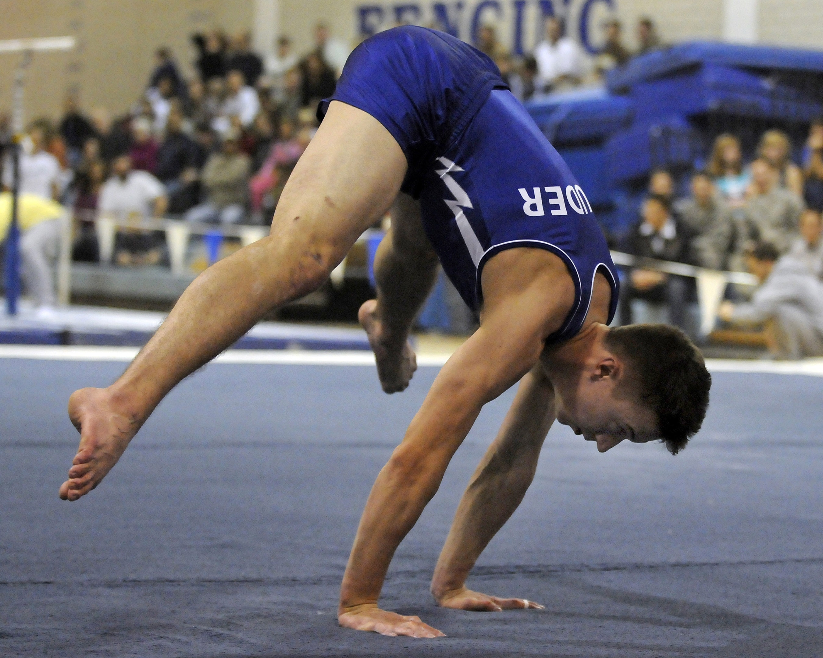 Floor (Gymnastics): The US Air Force Academy freshman Jacob Houder competes at the annual Rocky Mountain event. 2700x2160 HD Background.