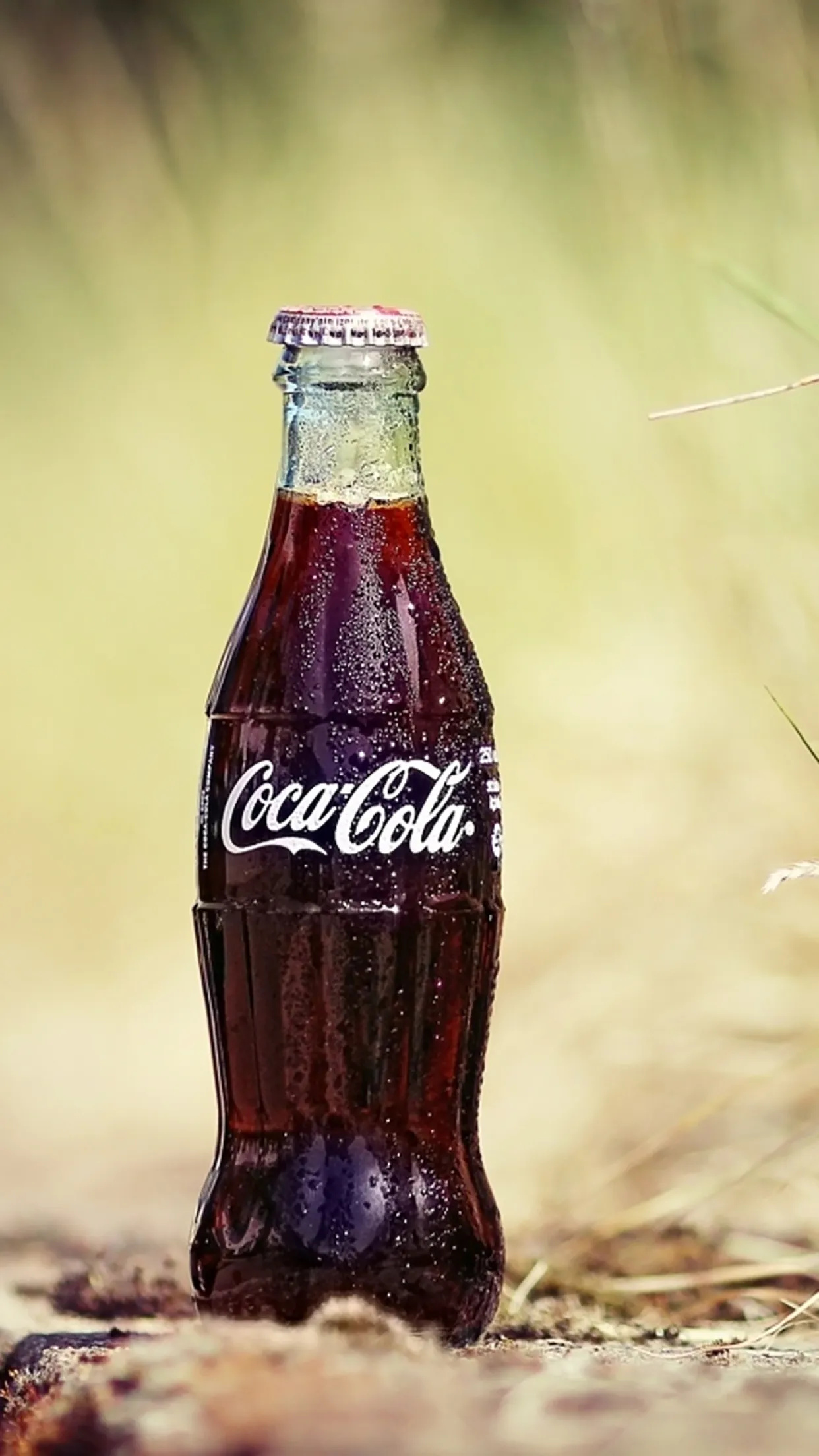 Coca-Cola: Iconic bottle of Cola, Created by The Root Glass Company of Indiana. 1250x2210 HD Background.