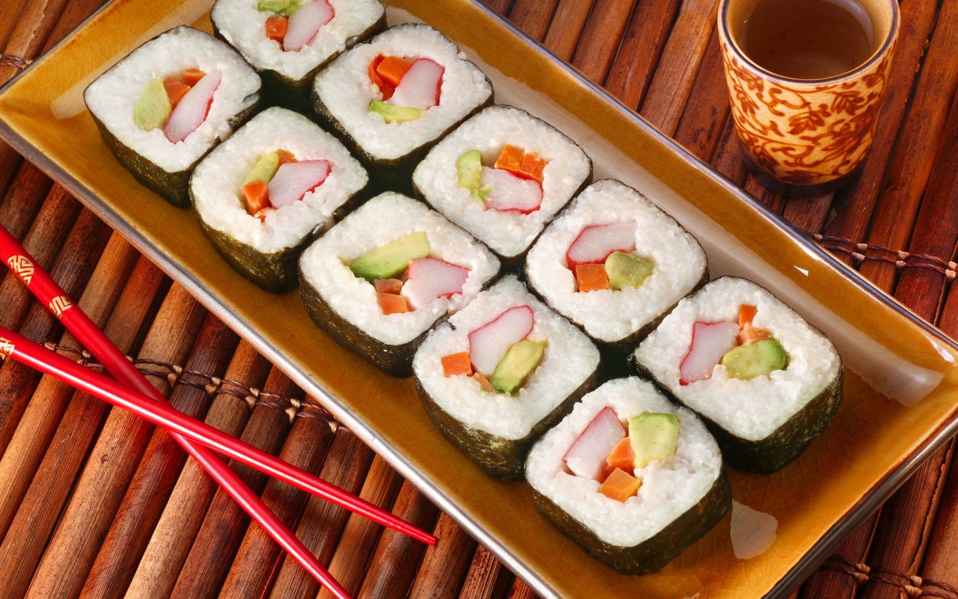 Sushi: Makizushi, a type of Japanese roll filled with various fillings. 1920x1200 HD Background.