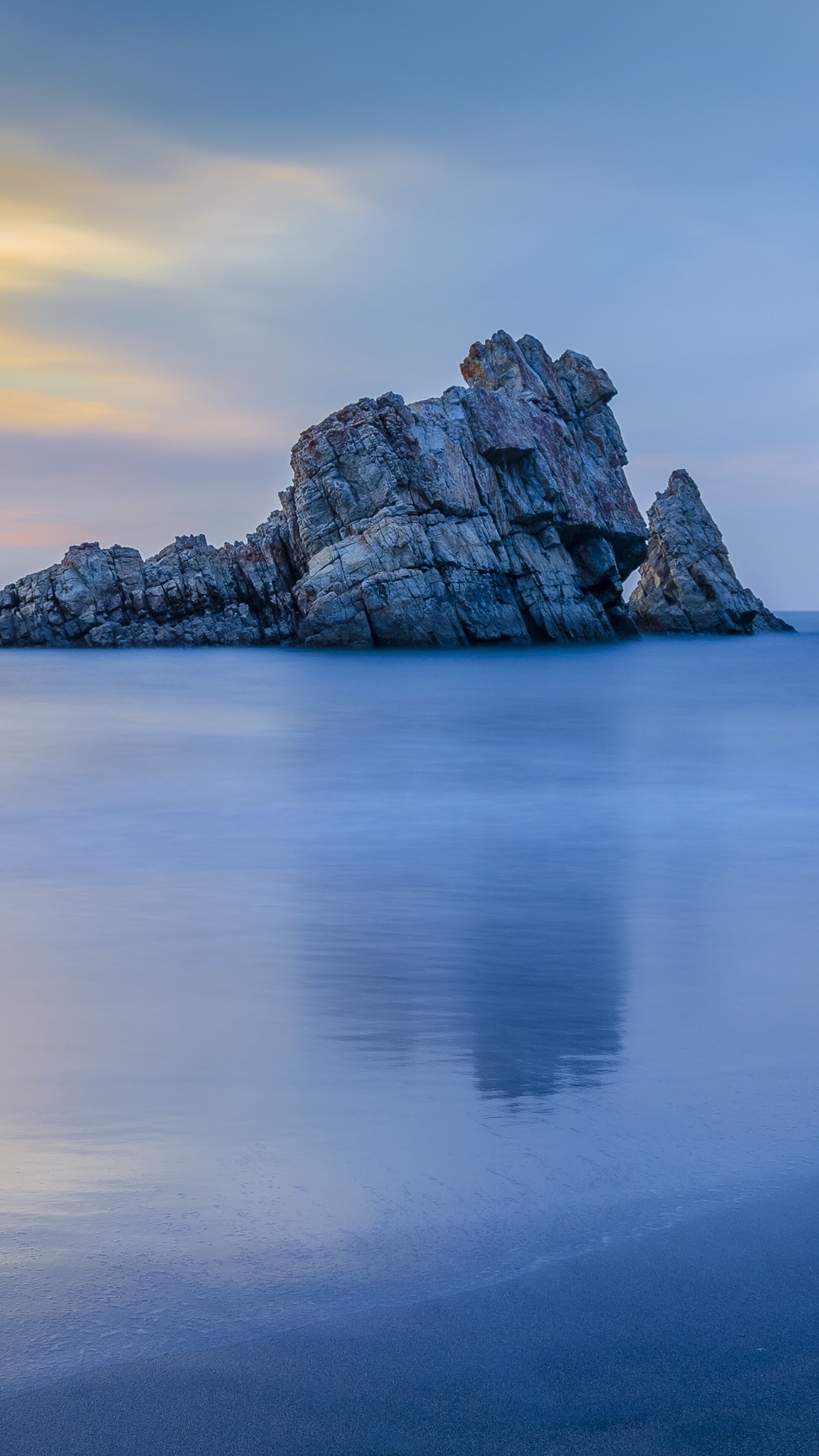 Geology: Sunset on an Asturian beach, Rocky island, Sea, Coastal landforms. 2160x3840 4K Background.