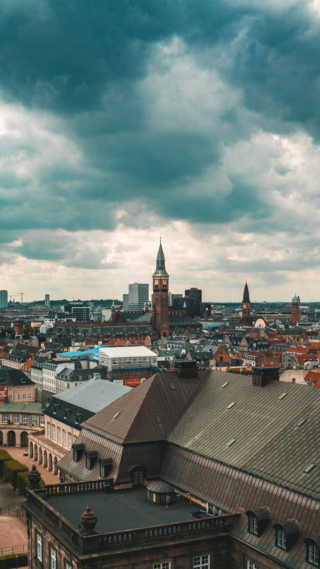 Architectural marvels of Copenhagen, Impressive skyline, Cloud-filled backdrop, Wallpaper-worthy, 1080x1920 Full HD Phone