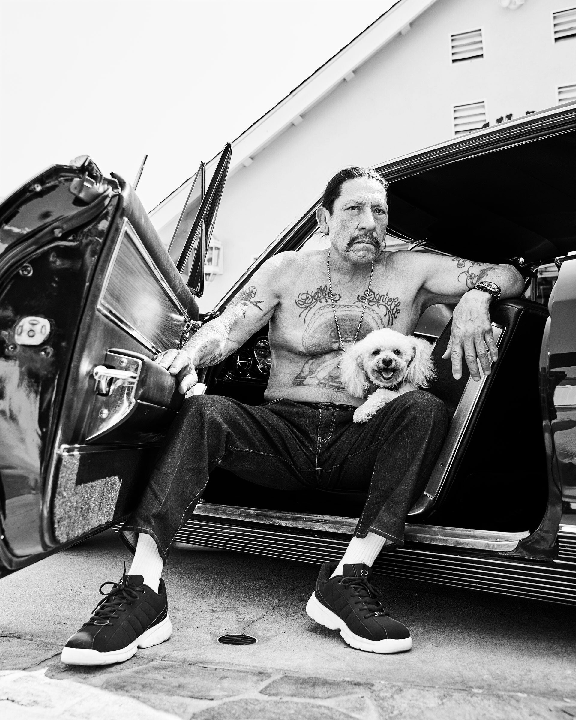 Danny Trejo: Danny Trejo's dog, Zelda, Black and white, Decades-long film career, Synonymous with the character Machete. 1920x2400 HD Background.