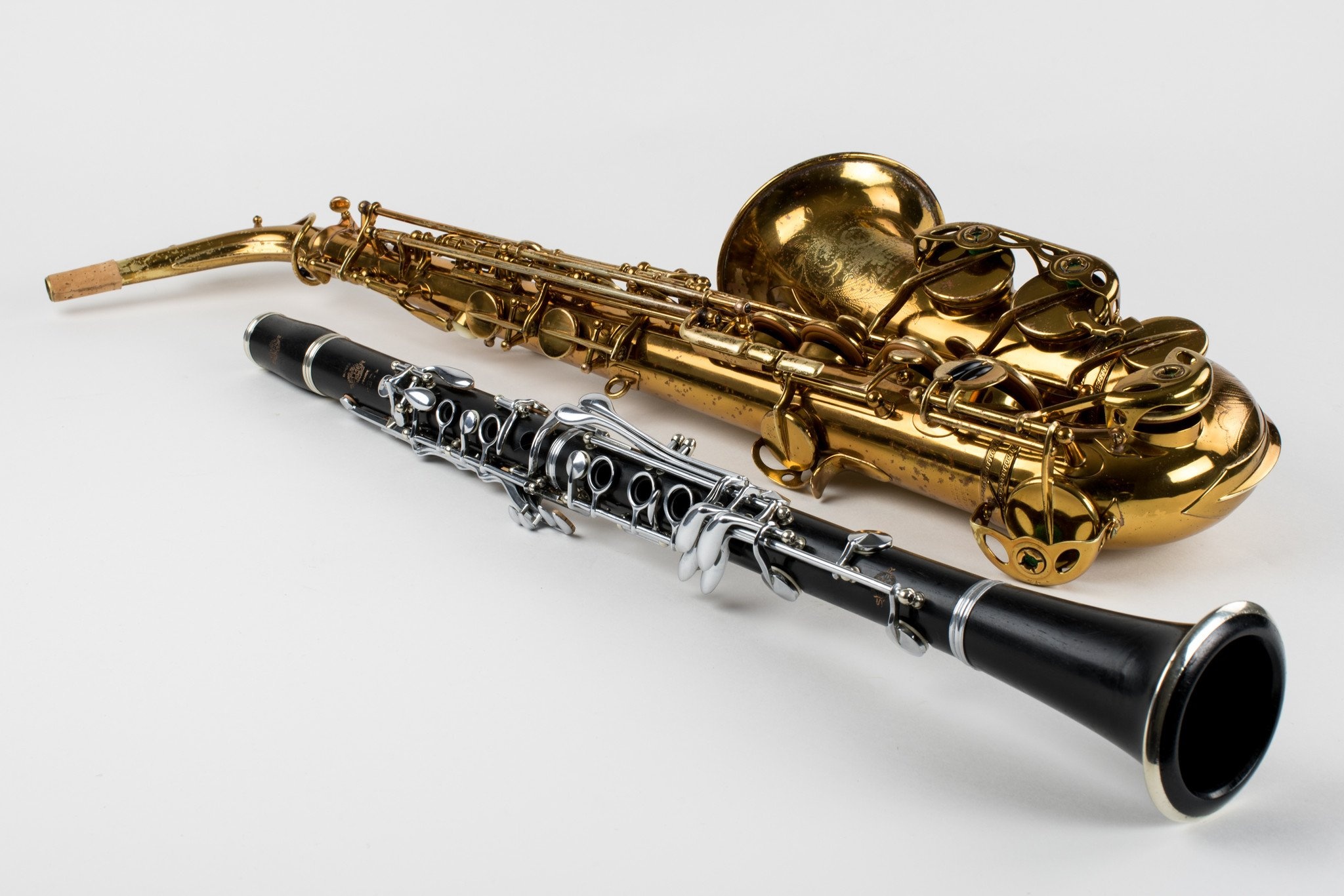 Saxophone: A brass instrument played by blowing into a mouthpiece and pressing keys to form musical notes. 2050x1370 HD Wallpaper.
