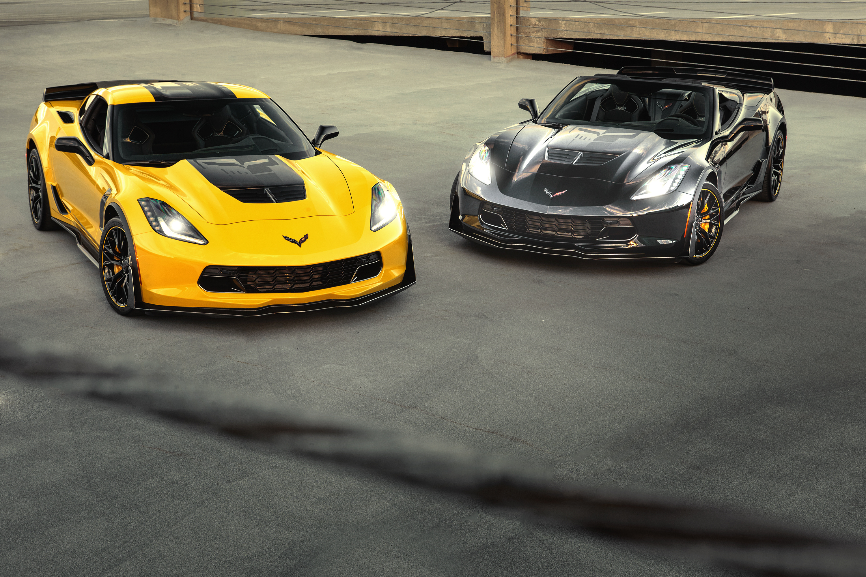 Corvette: Yellow Chevy ZR1 C7 and Dark Grey C7 Stingray, Supercars, Two-door convertible, High-speed driving. 3000x2000 HD Wallpaper.