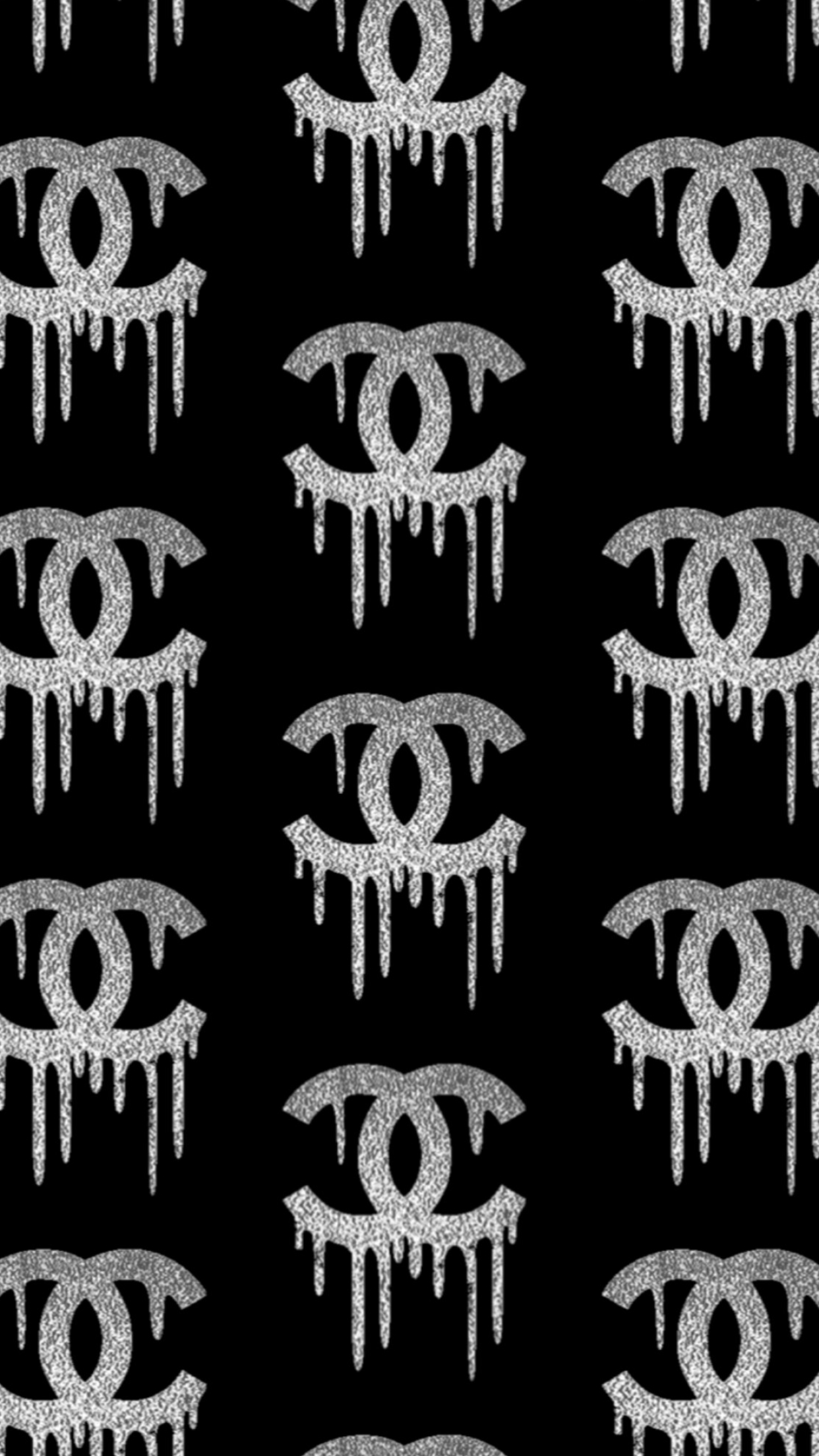 Chanel: A luxury fashion company that was established over 100 years ago. 1250x2210 HD Background.