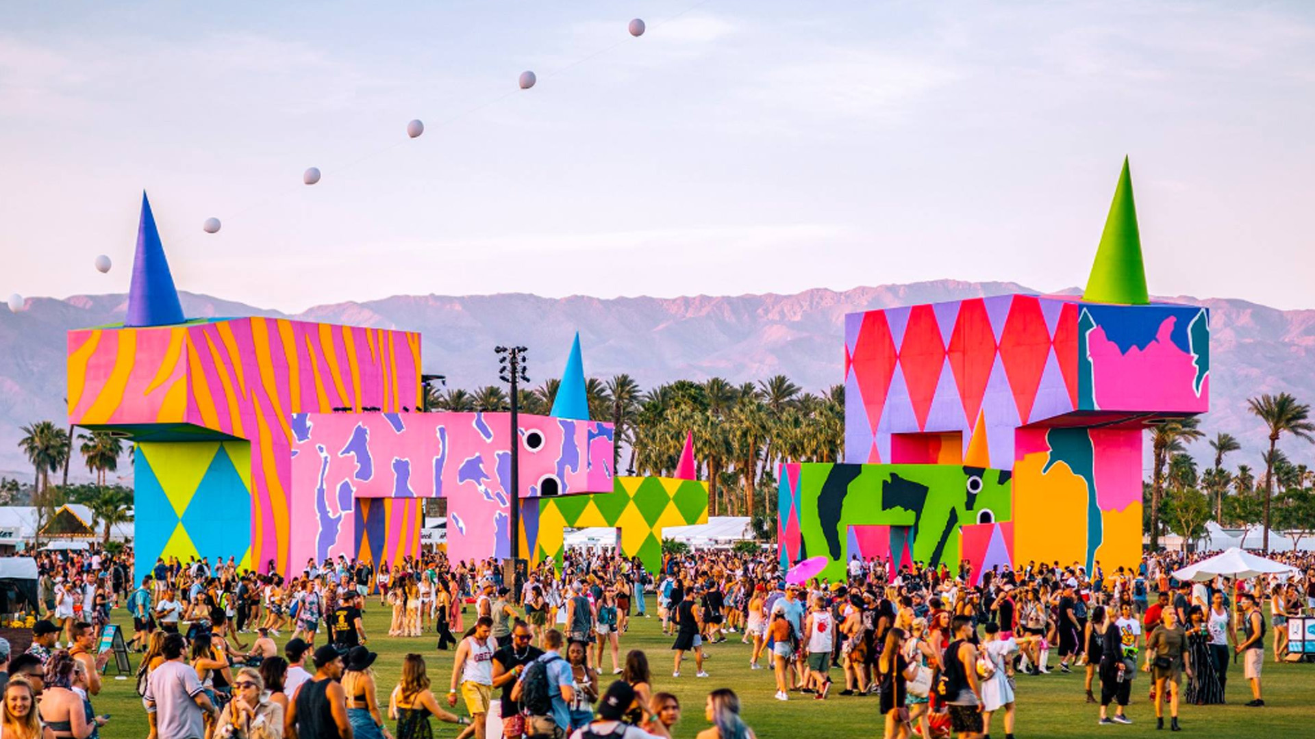 Coachella: The music festival plays out across five main stages: the Coachella Stage, Outdoor Theater, Gobi Tent, Mojave Tent, and the Sahara Tent. 1920x1080 Full HD Background.