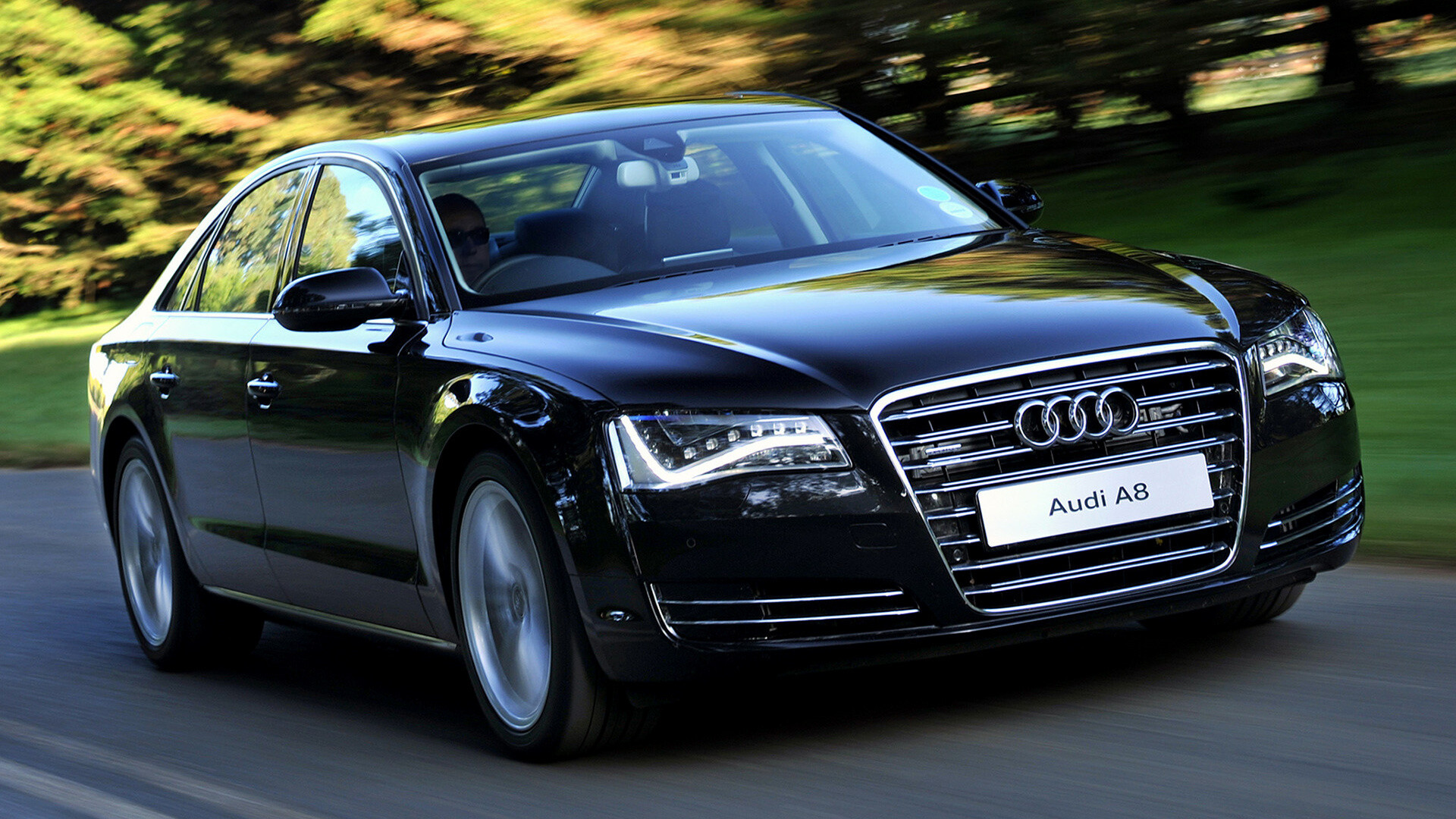 Audi A8: German sedan that represents status and exudes authority. 1920x1080 Full HD Background.