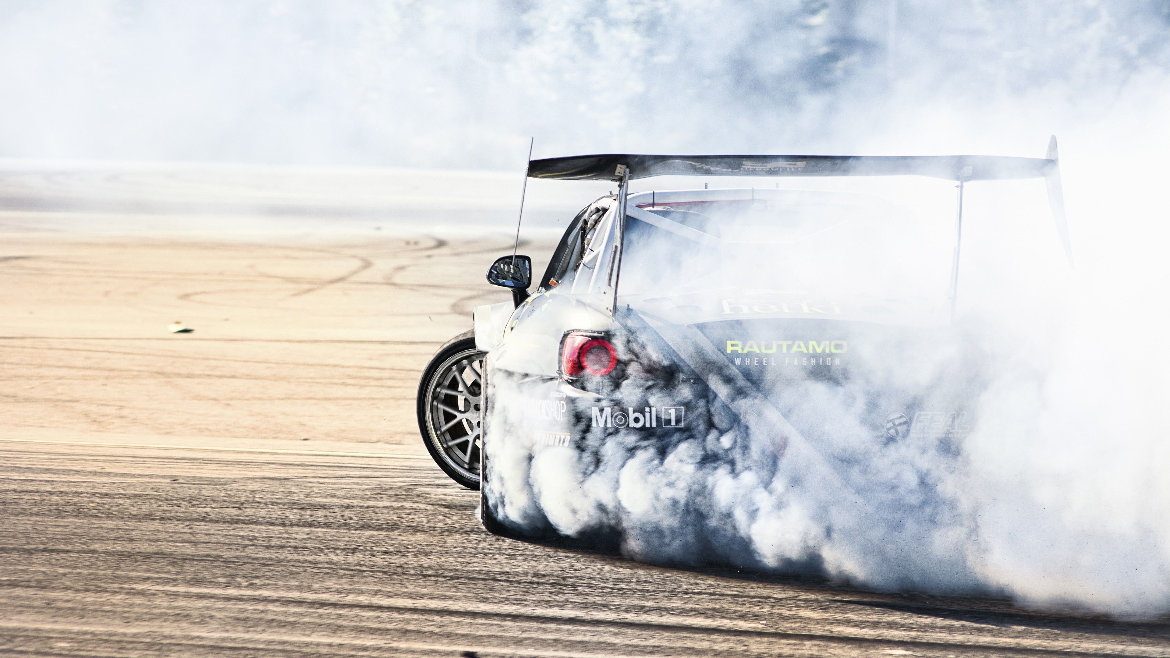 Drifting: Movil 1 racing oil, Competitive motorsport, Extreme driving, Racing track. 3840x2160 4K Background.