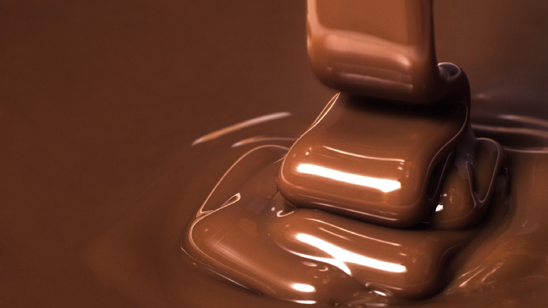 Chocolate: Used to flavor or coat various confections and bakery products. 1920x1080 Full HD Wallpaper.