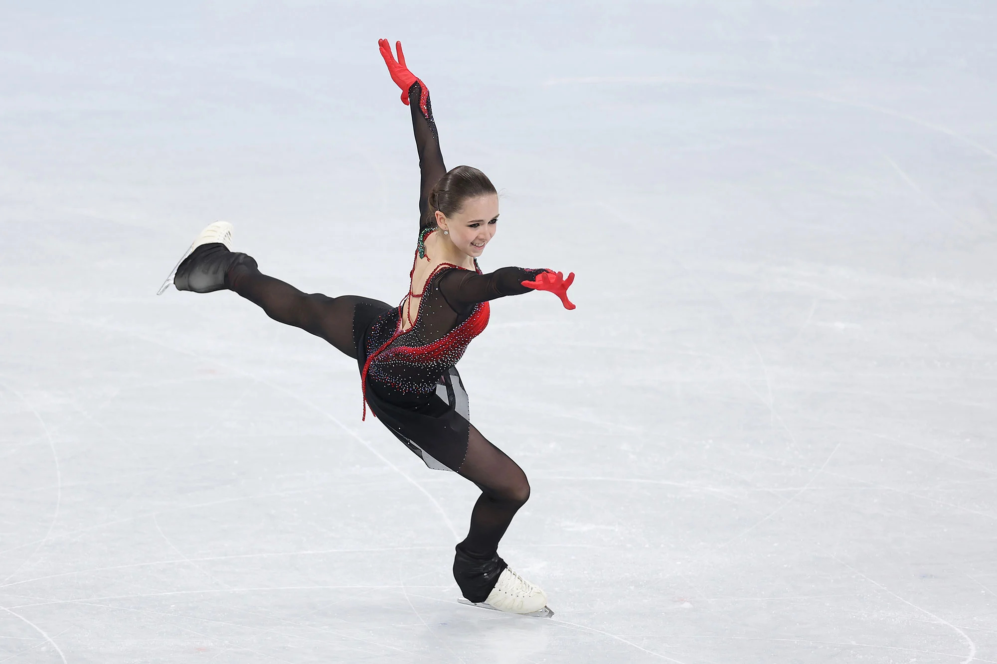 Single Skating: Kamila Valieva, A provisional 2022 Olympic champion in the team event. 2000x1340 HD Background.