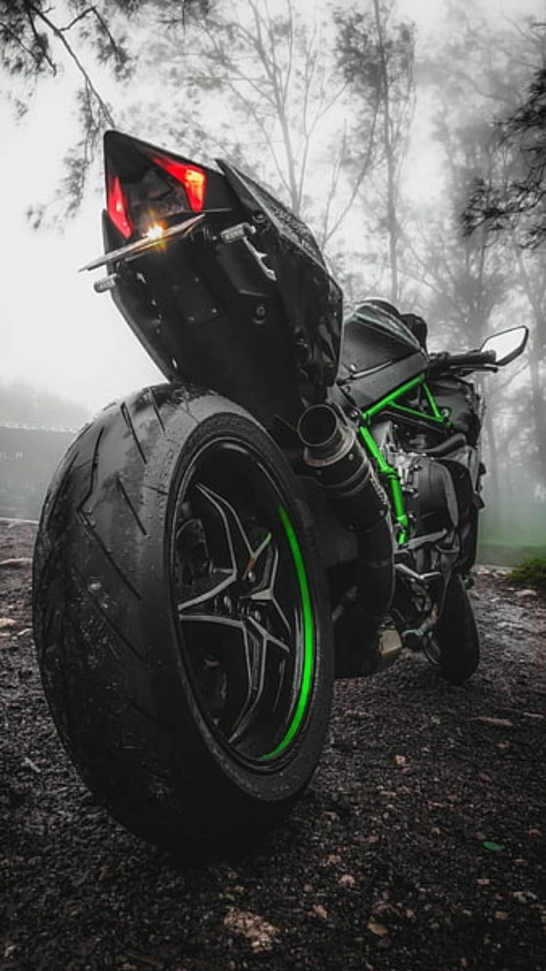 Kawasaki: The marque has notched up a total of 34 victories at the Isle of Man TT Races. 1080x1920 Full HD Background.