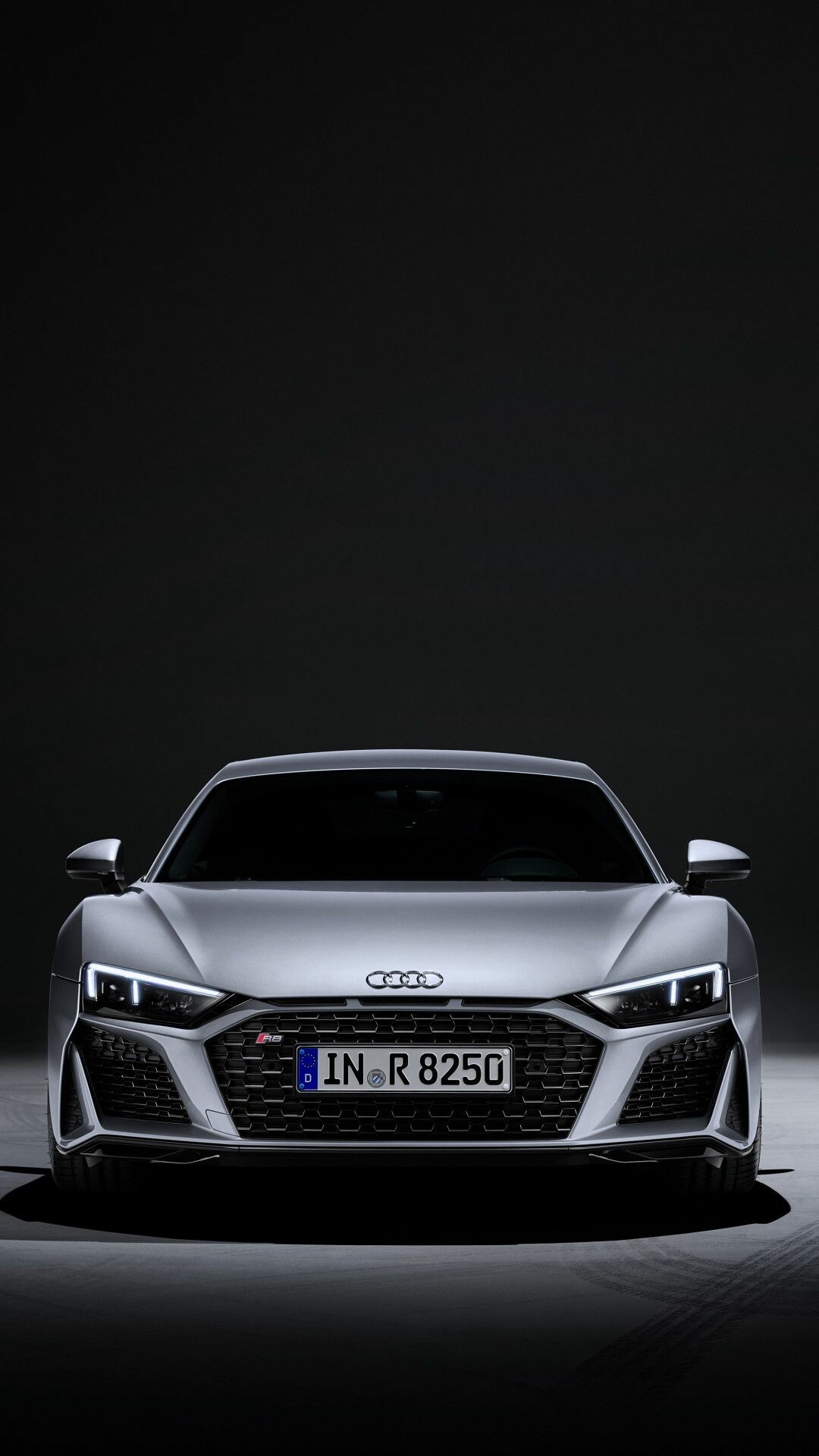 Audi: One of today's most successful luxury car brands, The four ring logo. 1080x1920 Full HD Background.